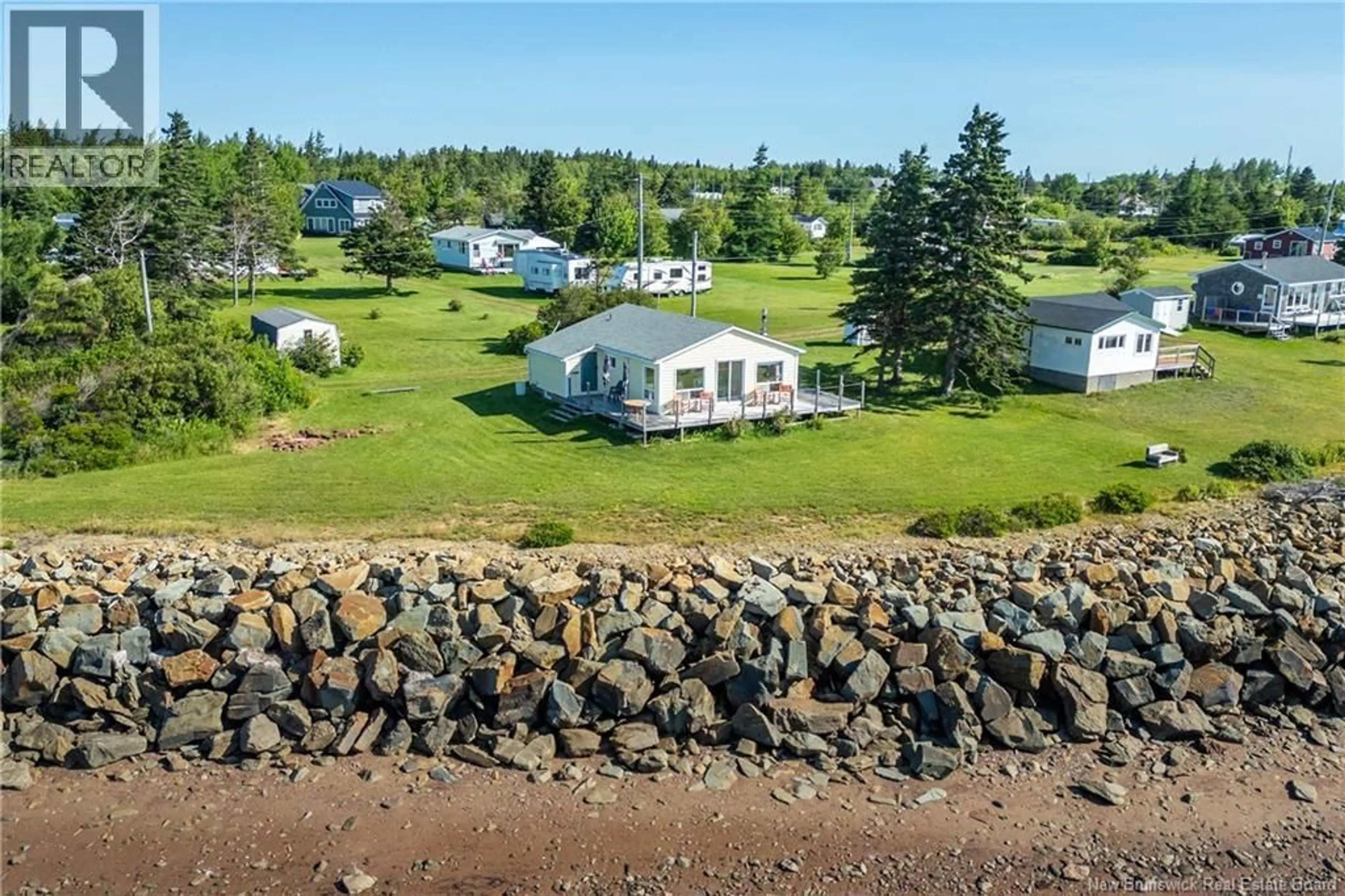 A pic from outside/outdoor area/front of a property/back of a property/a pic from drone, water/lake/river/ocean view for 107 HICKS BEACH ROAD, Upper Cape New Brunswick E4M0B1