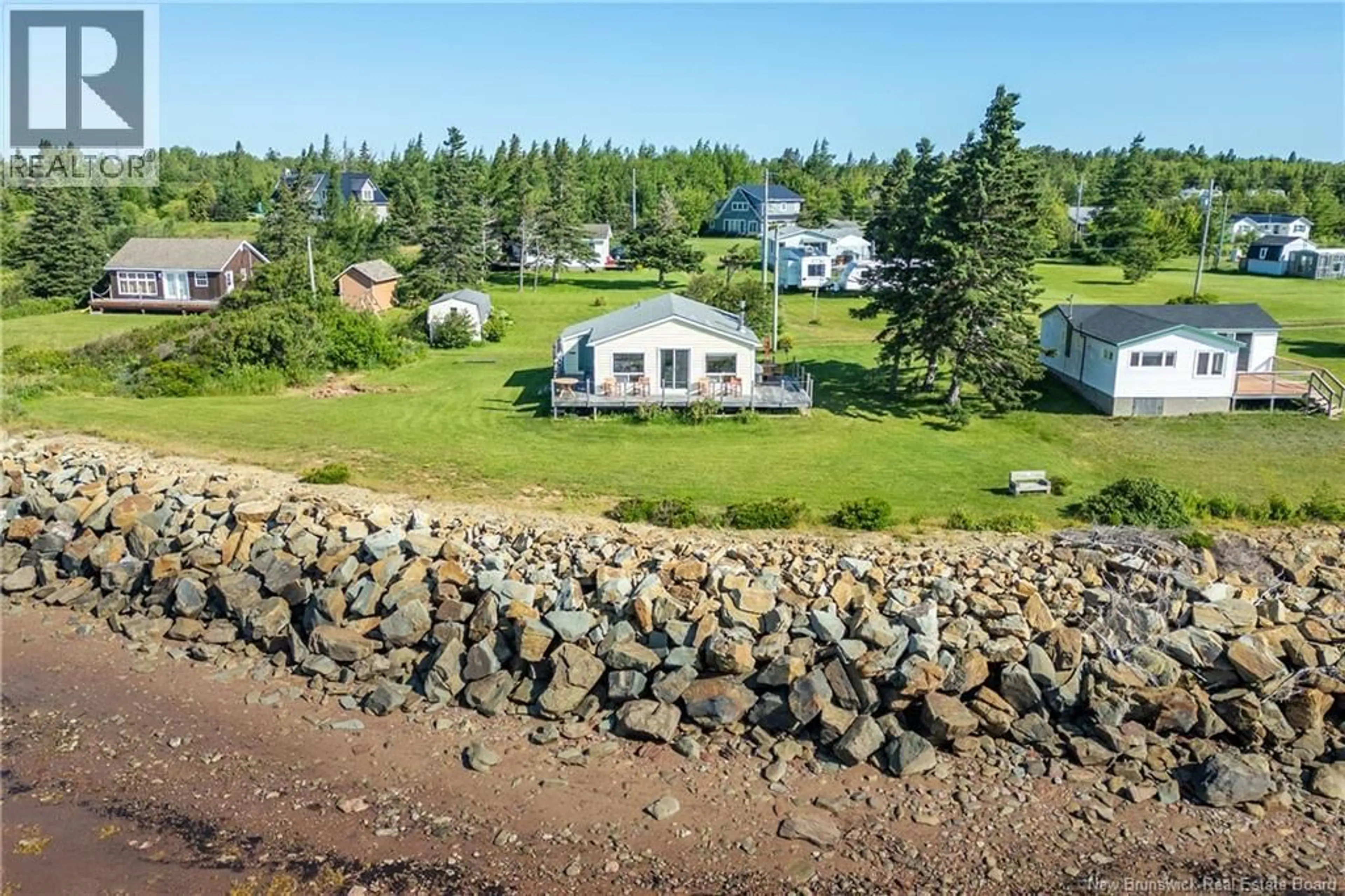 A pic from outside/outdoor area/front of a property/back of a property/a pic from drone, water/lake/river/ocean view for 107 HICKS BEACH ROAD, Upper Cape New Brunswick E4M0B1