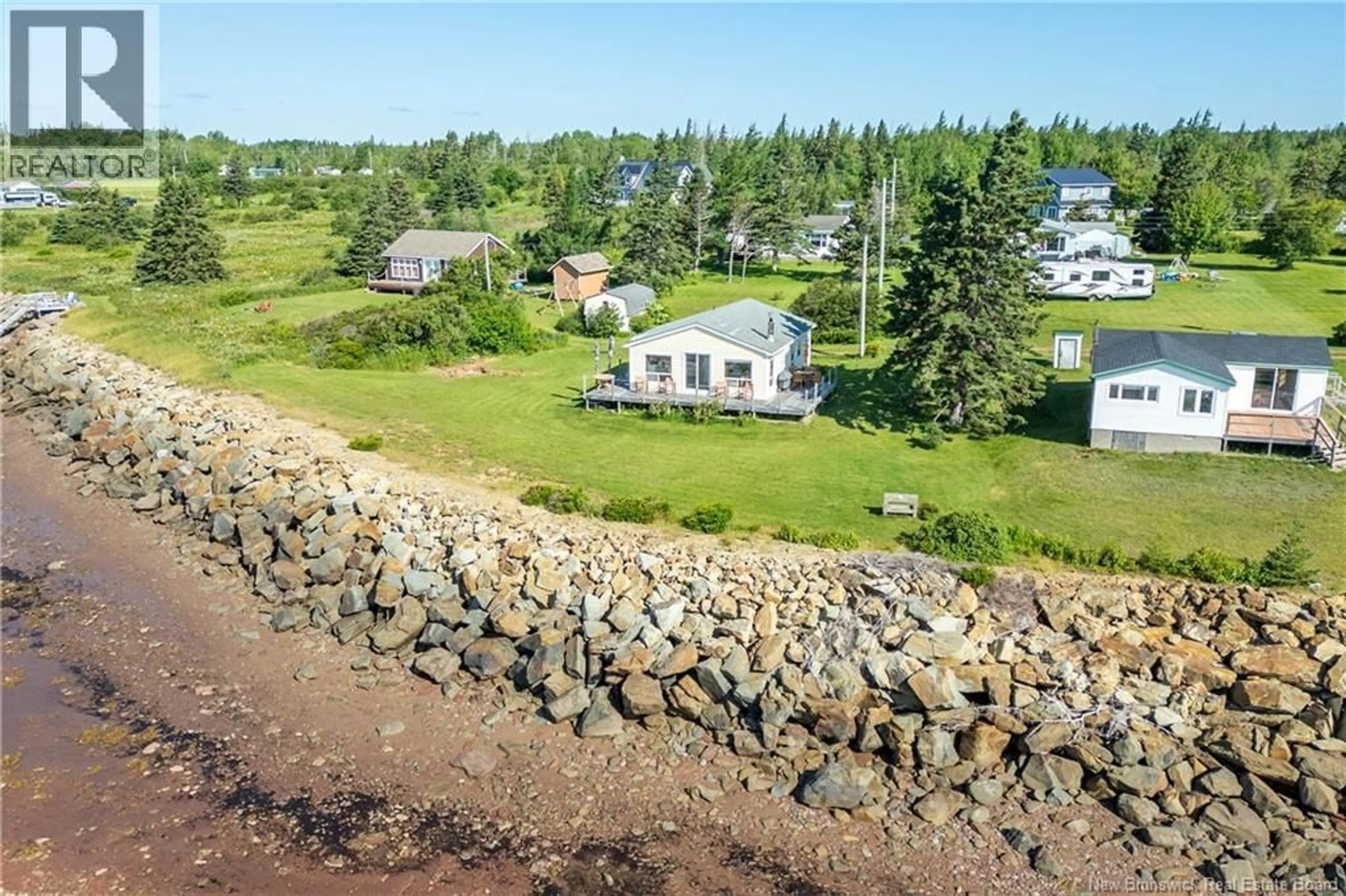 A pic from outside/outdoor area/front of a property/back of a property/a pic from drone, water/lake/river/ocean view for 107 HICKS BEACH ROAD, Upper Cape New Brunswick E4M0B1