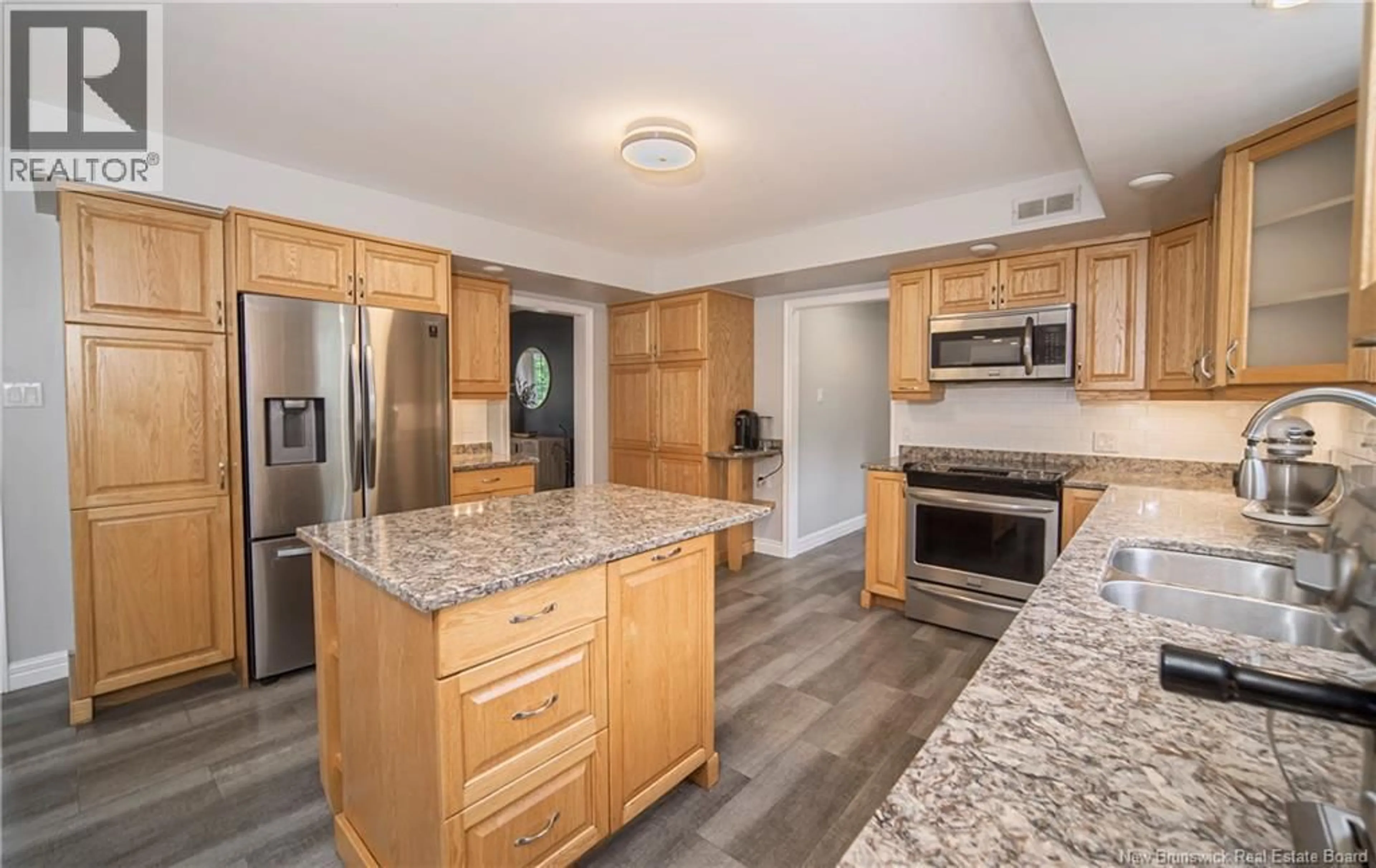 Open concept kitchen, ceramic/tile floor for 19 HOWE CRESCENT, Oromocto New Brunswick E2V2S1