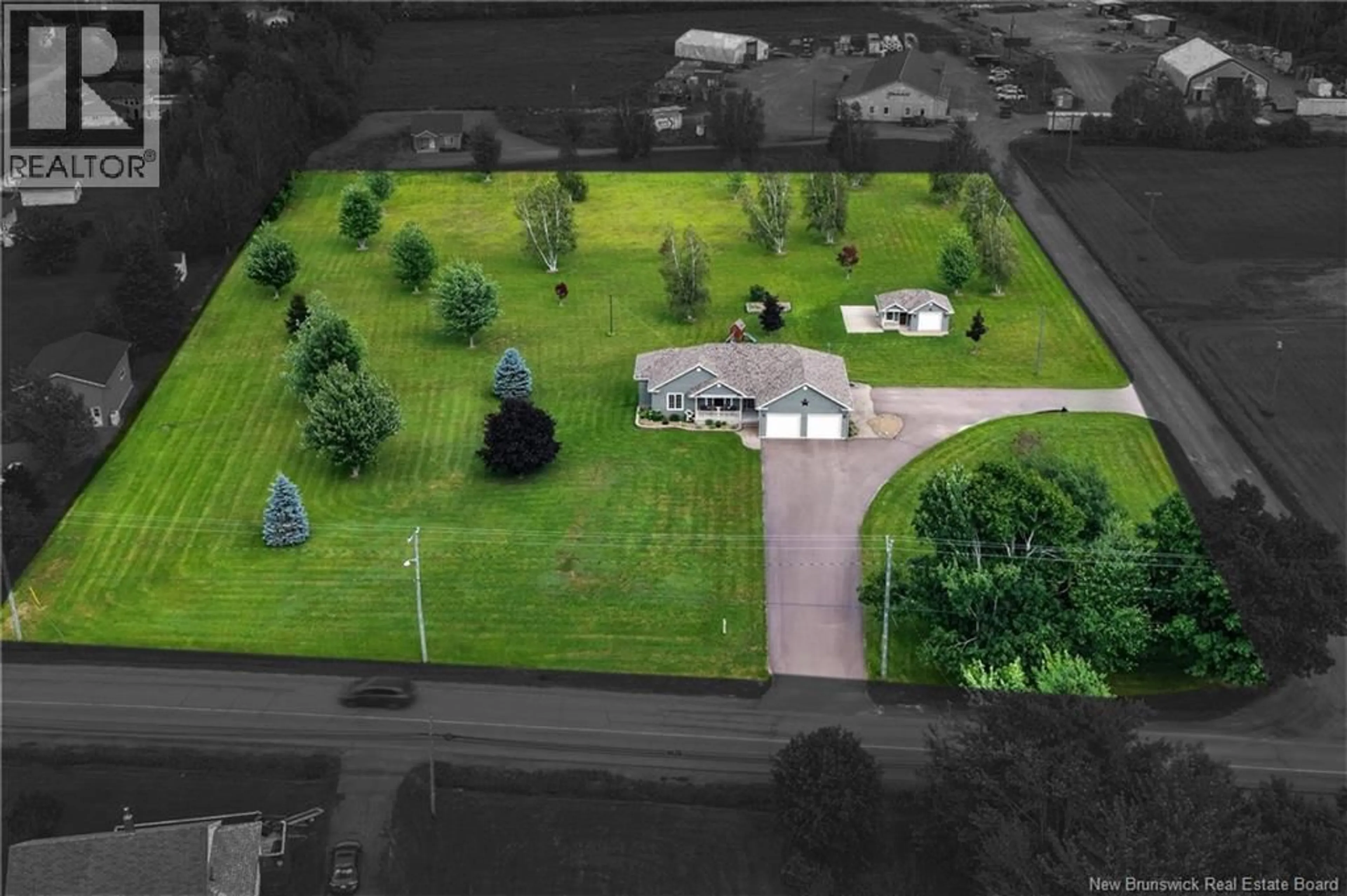 A pic from outside/outdoor area/front of a property/back of a property/a pic from drone, street for 3042 ROUTE 132, Scoudouc New Brunswick E4P3S4