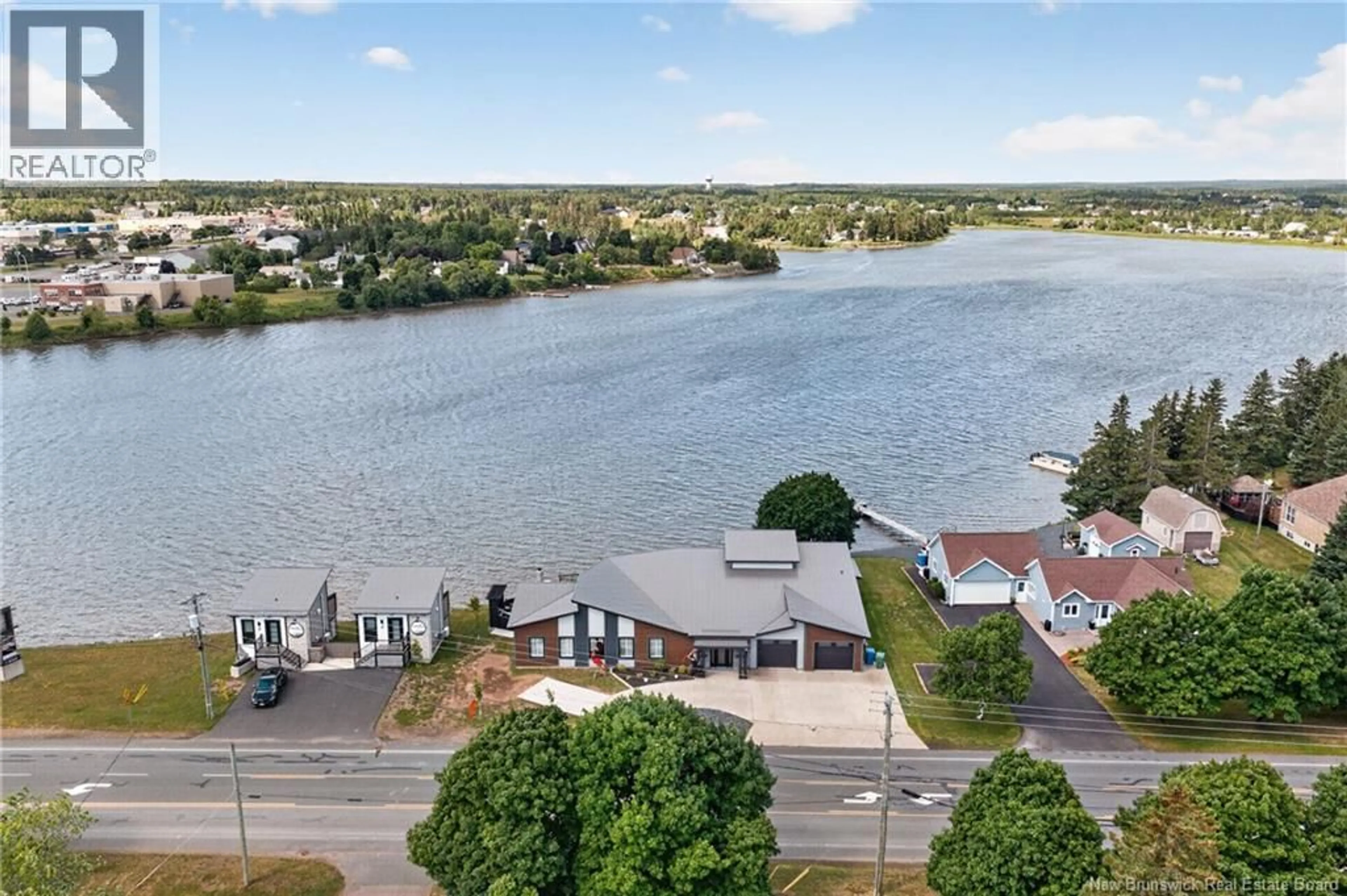 A pic from outside/outdoor area/front of a property/back of a property/a pic from drone, water/lake/river/ocean view for 3285 RUE PRINCIPALE, Tracadie New Brunswick E1X1A3