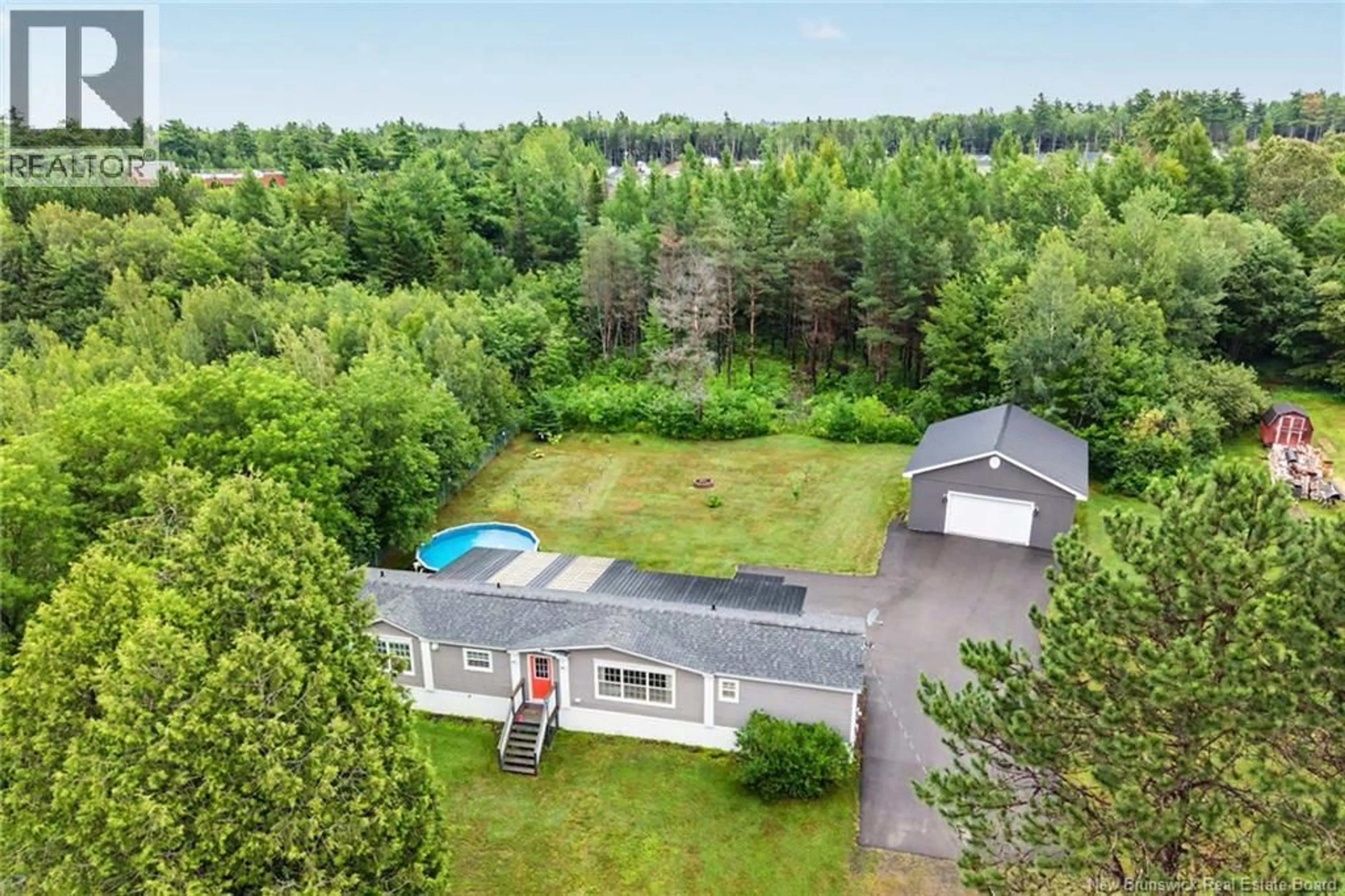 A pic from outside/outdoor area/front of a property/back of a property/a pic from drone, forest/trees view for 19 PINE STREET, Chipman New Brunswick E4A1Z4