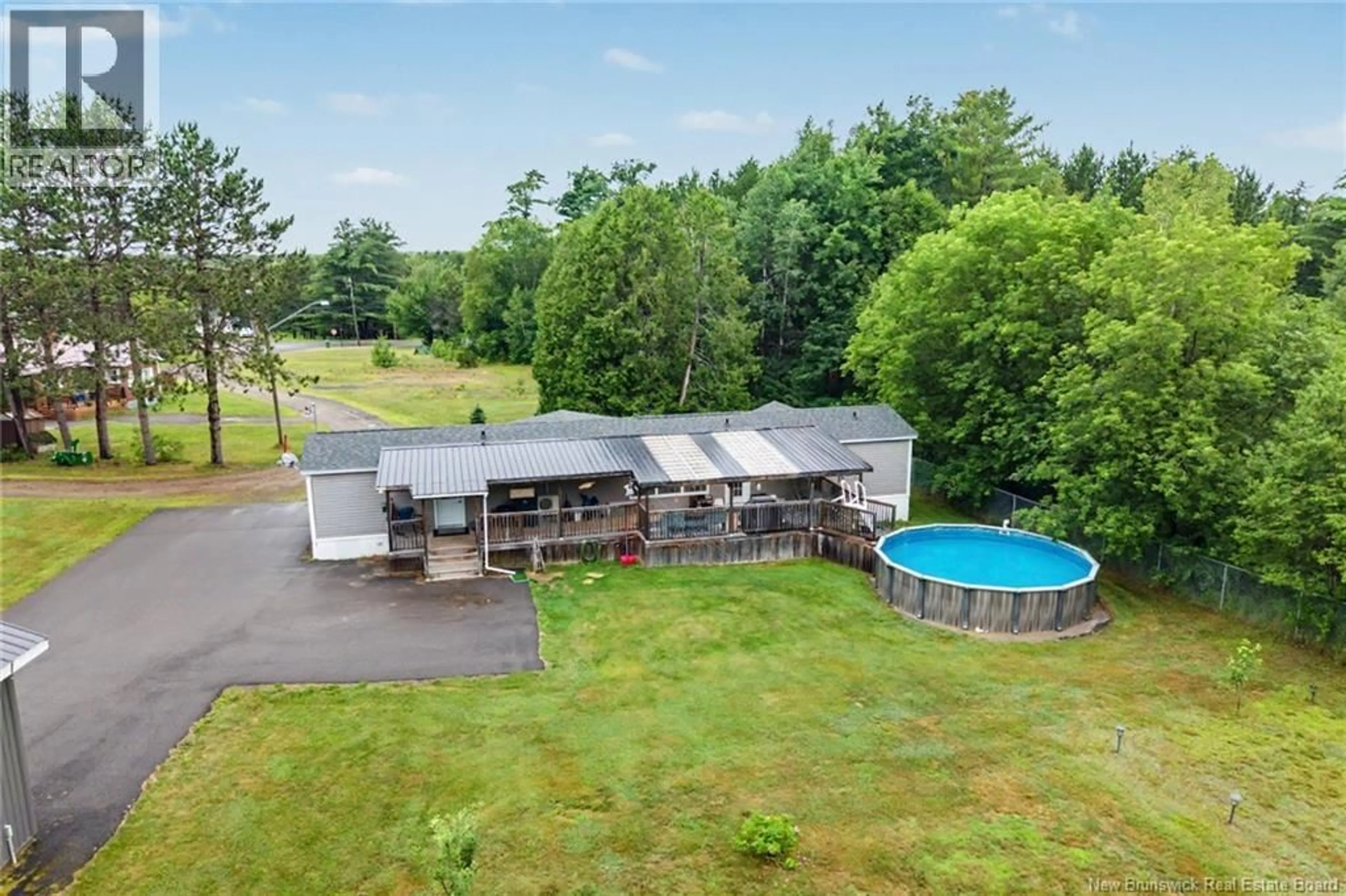 A pic from outside/outdoor area/front of a property/back of a property/a pic from drone, water/lake/river/ocean view for 19 PINE STREET, Chipman New Brunswick E4A1Z4