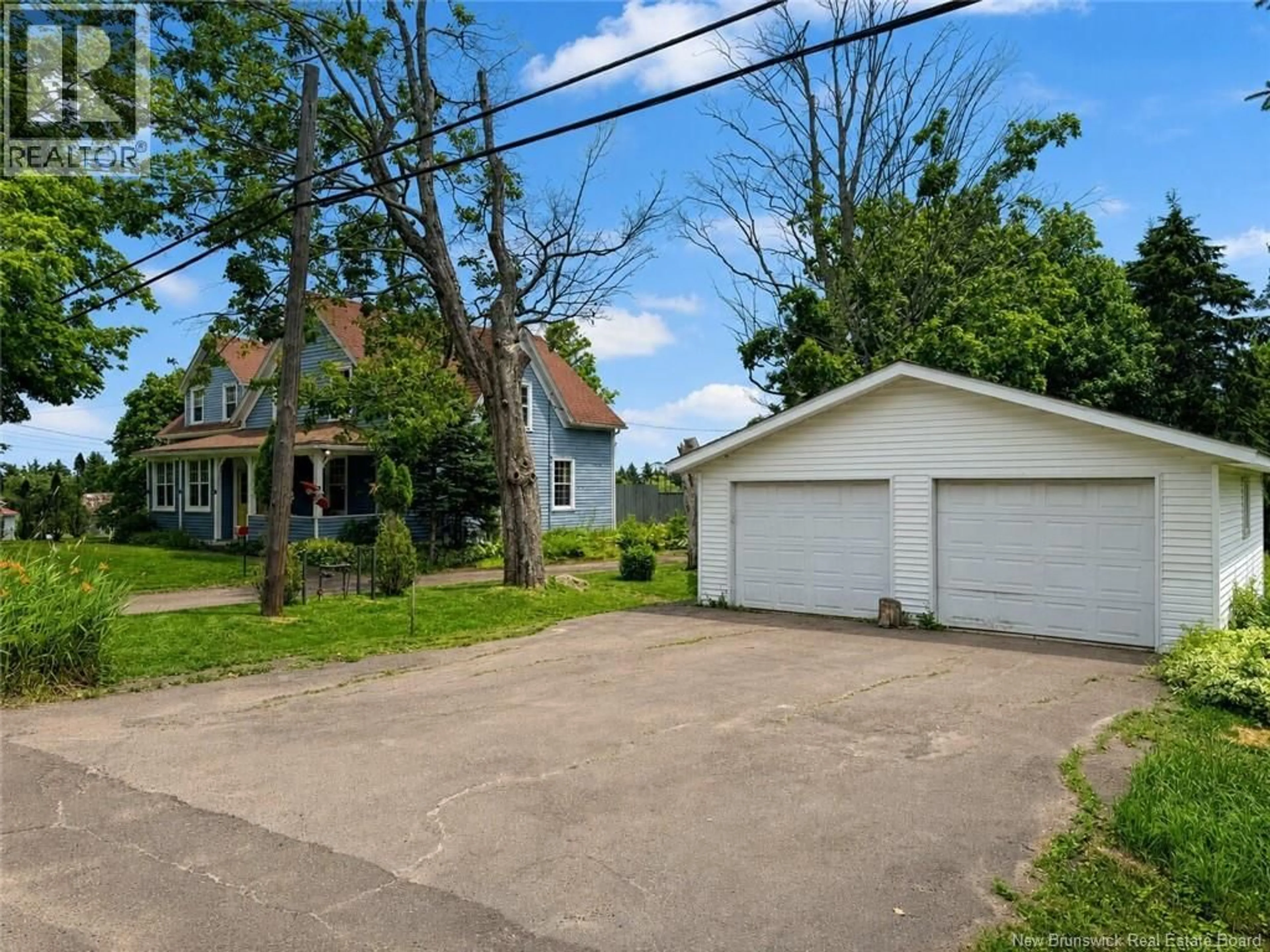 A pic from outside/outdoor area/front of a property/back of a property/a pic from drone, street for 115-123 POND SHORE ROAD, Sackville New Brunswick E4L1L9