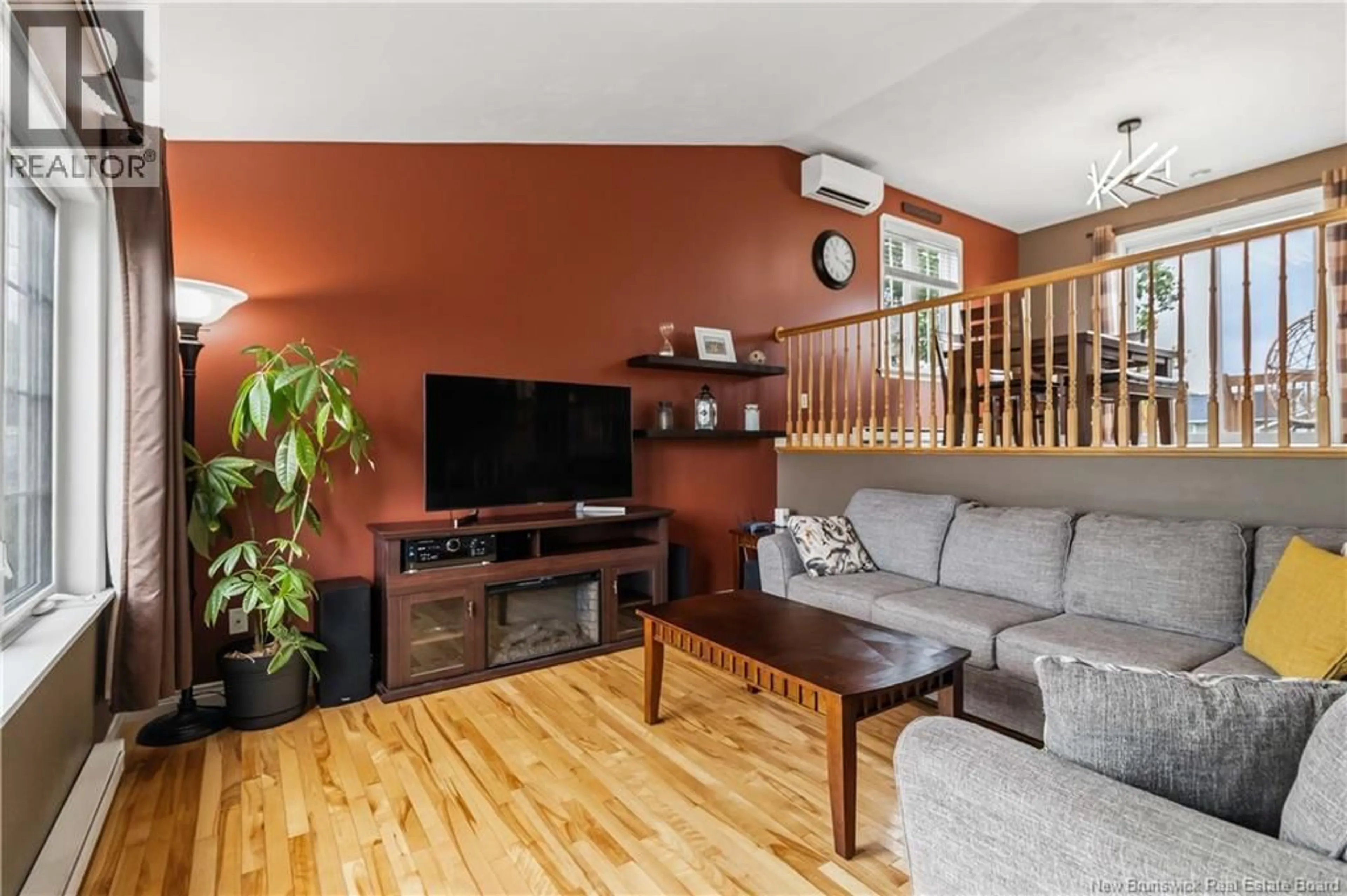 Living room with furniture, wood/laminate floor for 378 LEBLANC ROAD, Dieppe New Brunswick E1A7N4