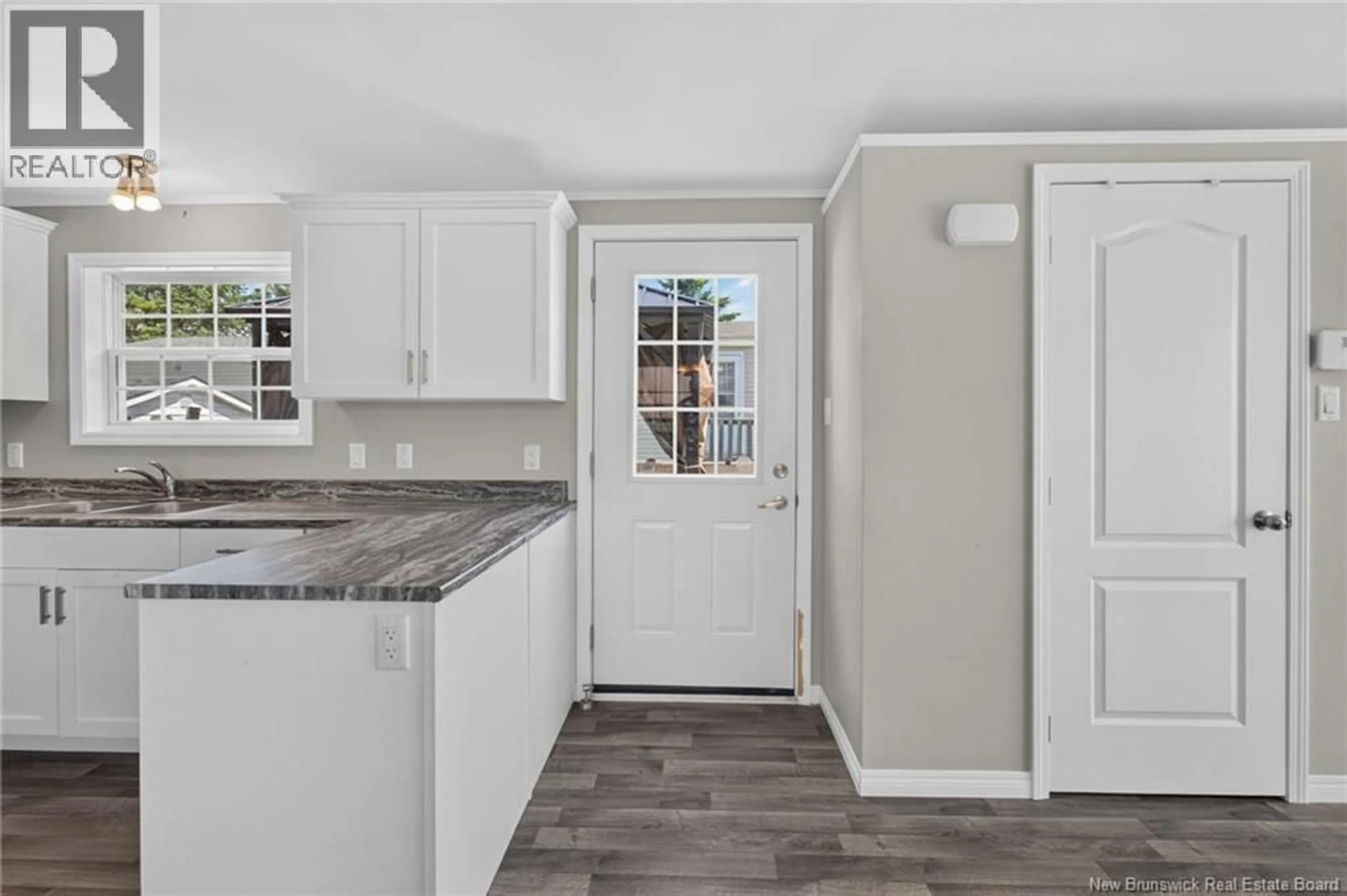 Open concept kitchen, ceramic/tile floor for 38 ULYSSE, Dieppe New Brunswick E1A7L7