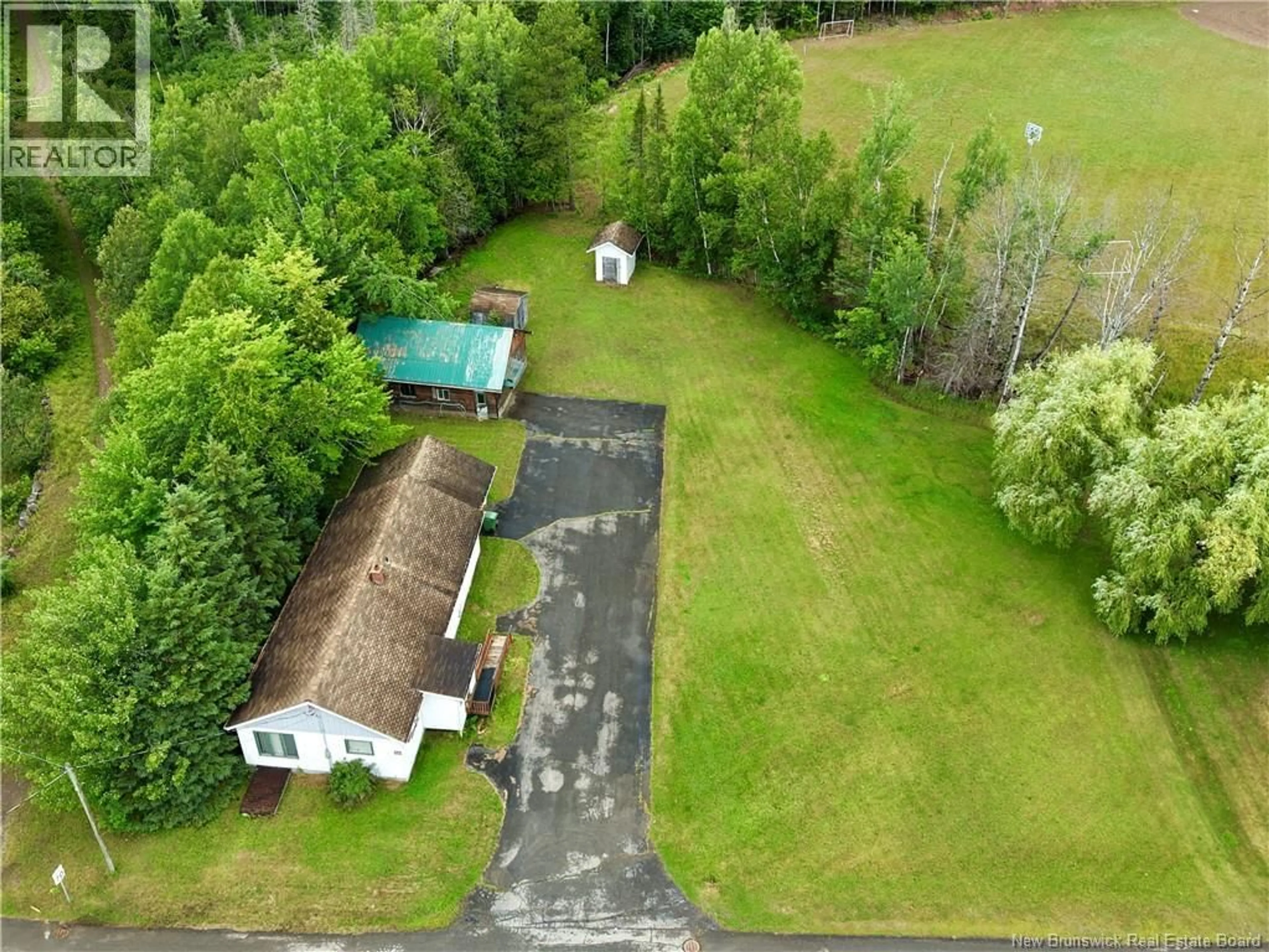 A pic from outside/outdoor area/front of a property/back of a property/a pic from drone, unknown for 111 MAIN STREET, Plaster Rock New Brunswick E7G2H2