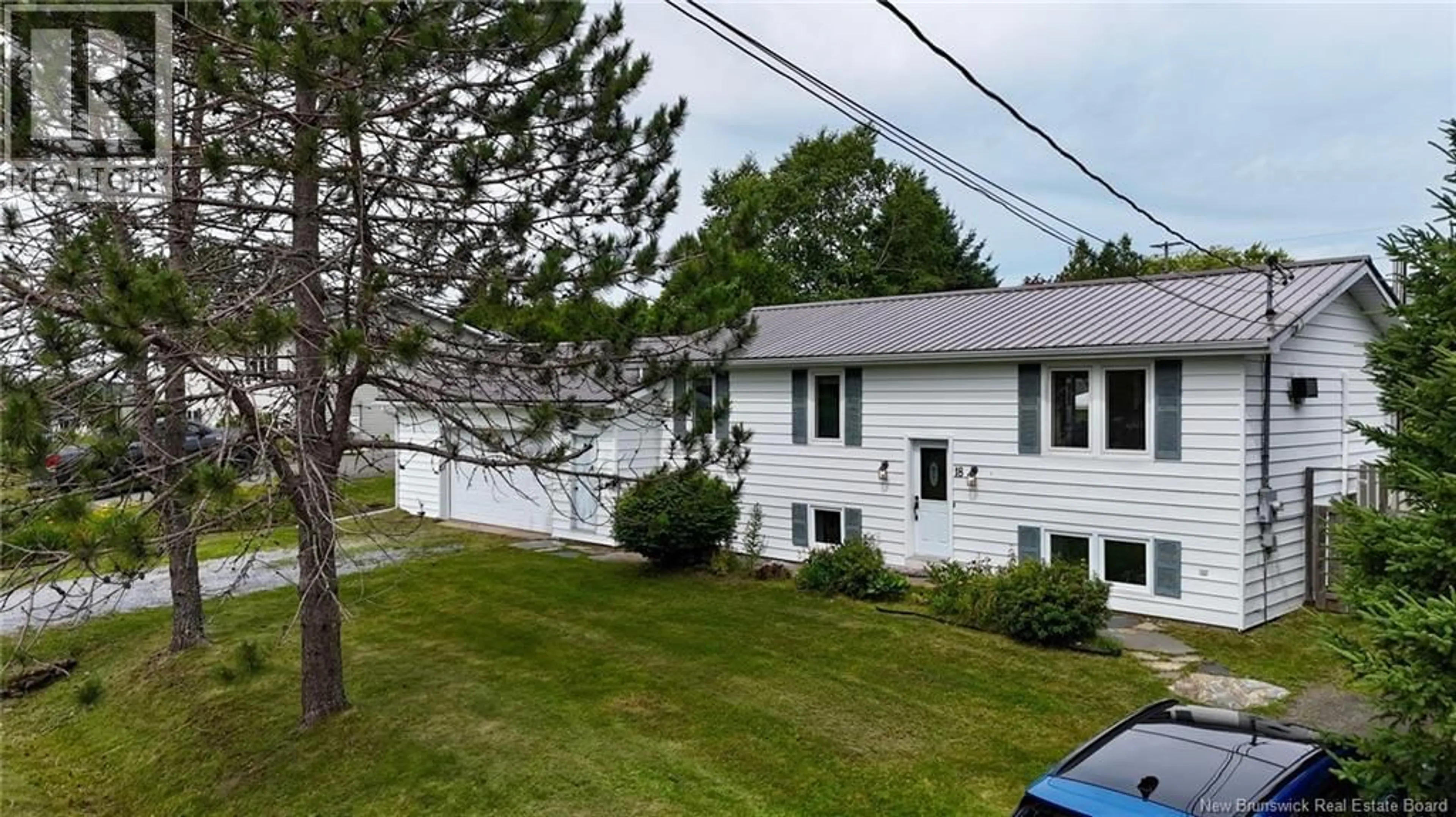 A pic from outside/outdoor area/front of a property/back of a property/a pic from drone, street for 18 PRINCE WILLIAM STREET, St George New Brunswick E5C3L8