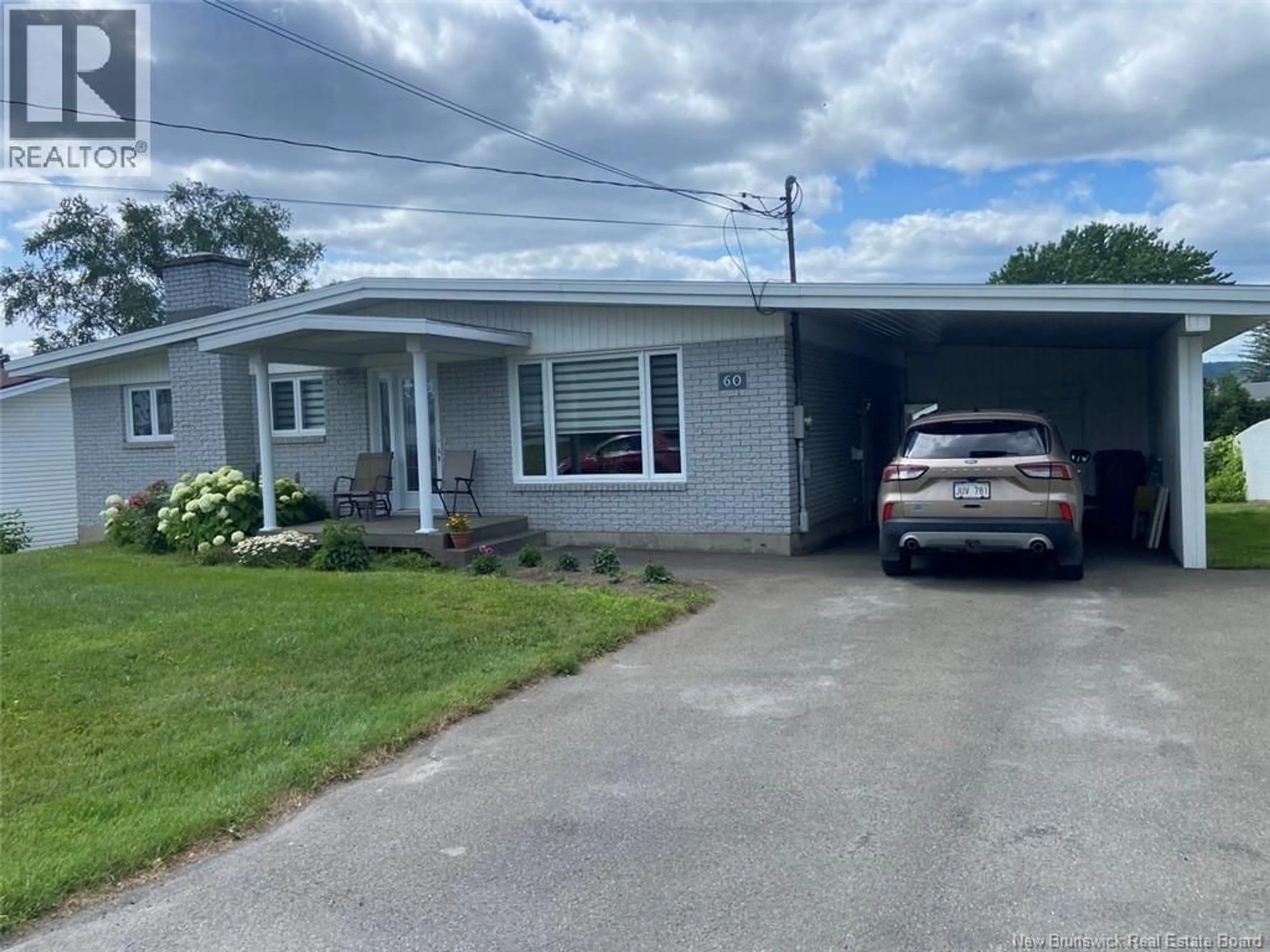 Home with vinyl exterior material, street for 60 32ND AVENUE, Edmundston New Brunswick E3V2S2