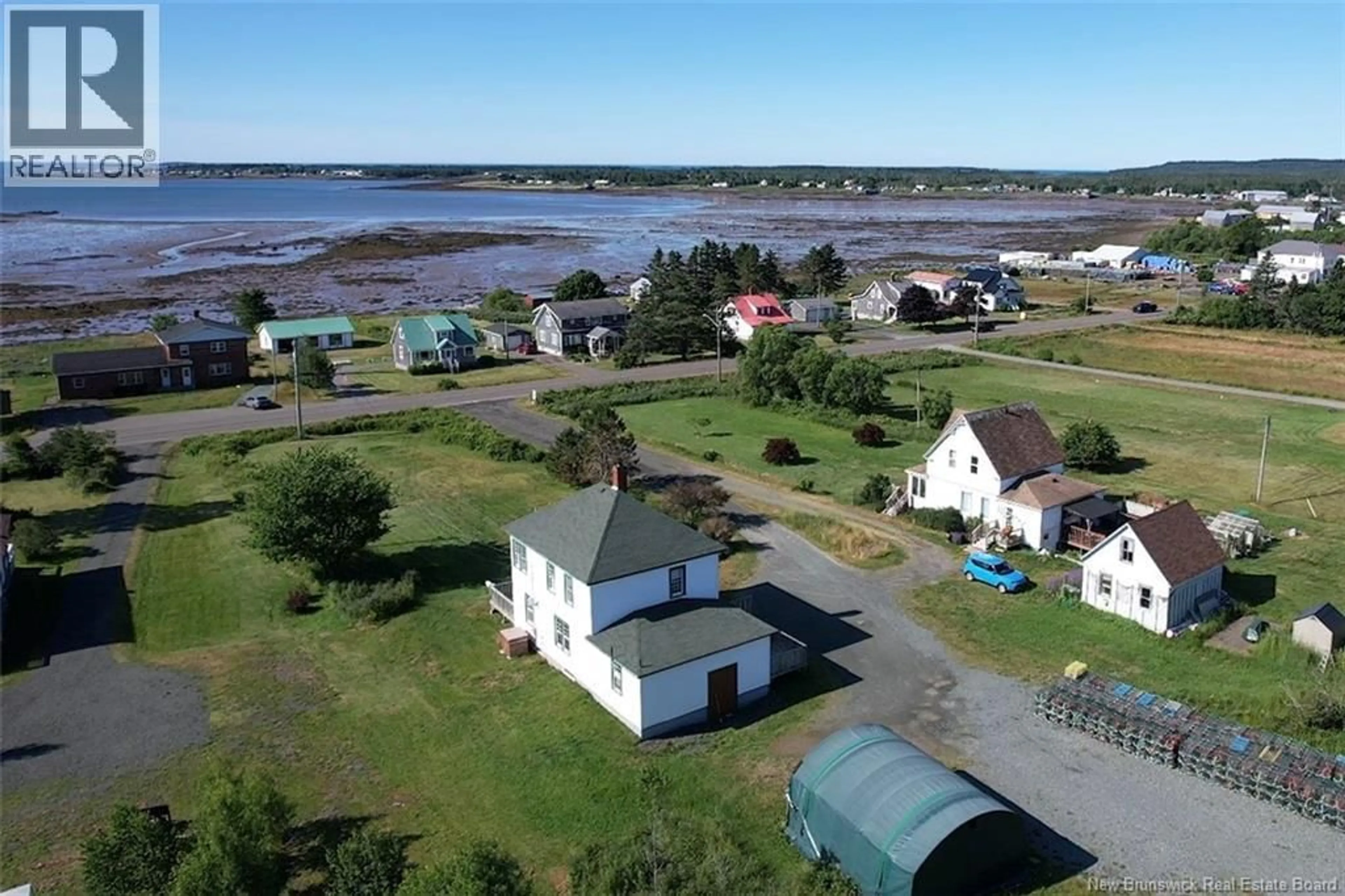 A pic from outside/outdoor area/front of a property/back of a property/a pic from drone, water/lake/river/ocean view for 1102 ROUTE 776, Grand Manan New Brunswick E5G4E9