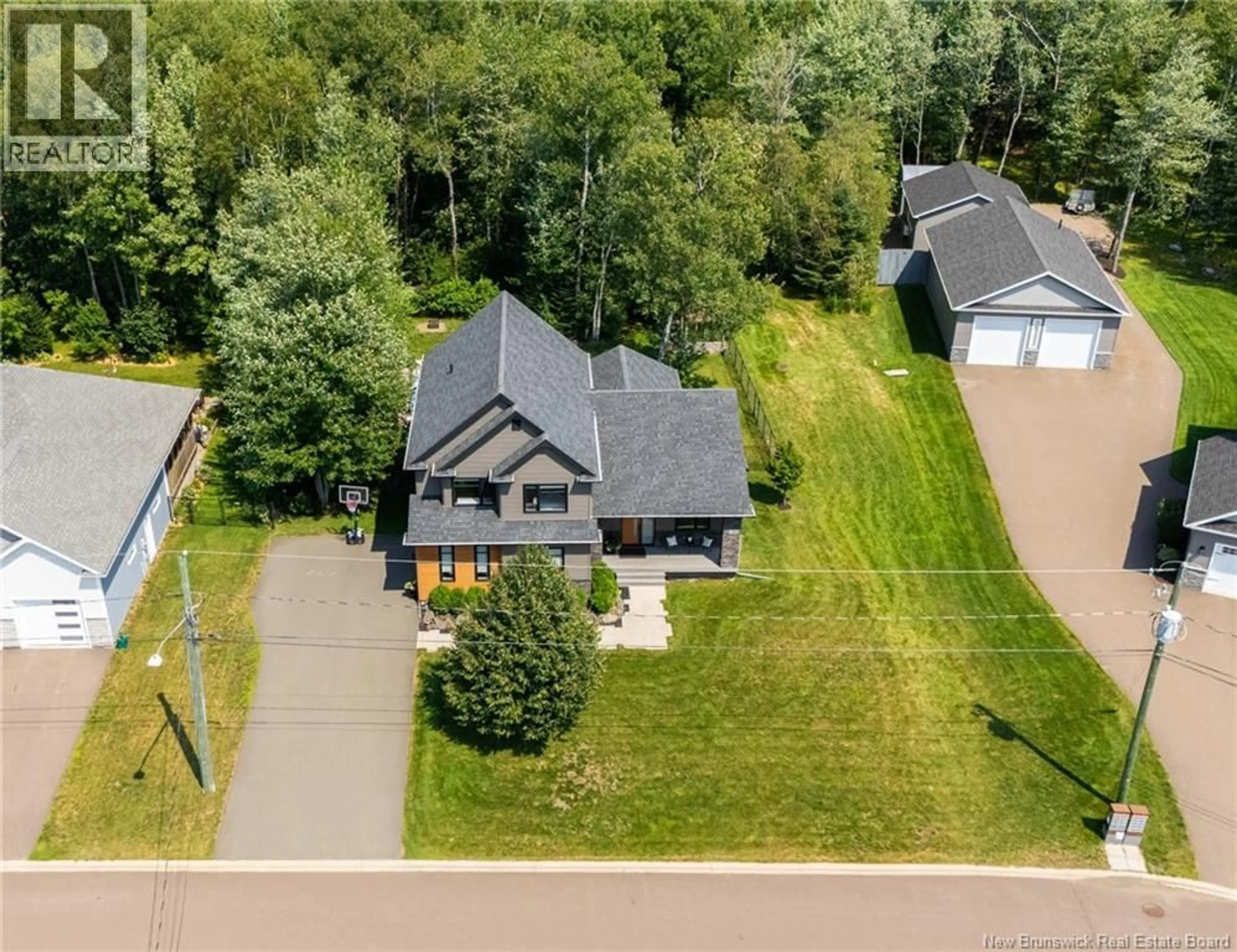 A pic from outside/outdoor area/front of a property/back of a property/a pic from drone, unknown for 165 LAROCHELLE, Dieppe New Brunswick E1A9N5
