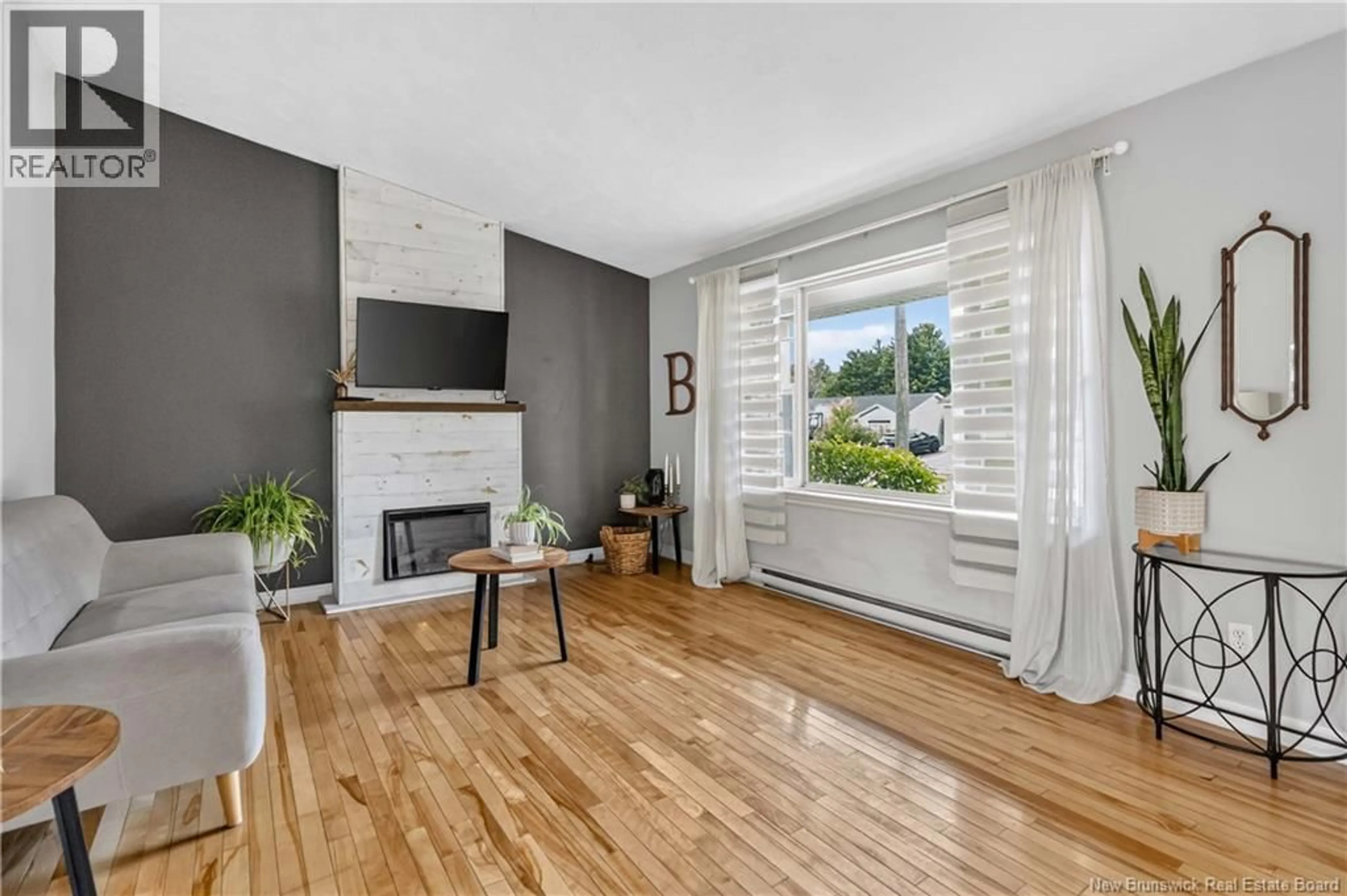 Living room with furniture, unknown for 39 LOTUSROW DRIVE, Moncton New Brunswick E1E4W1