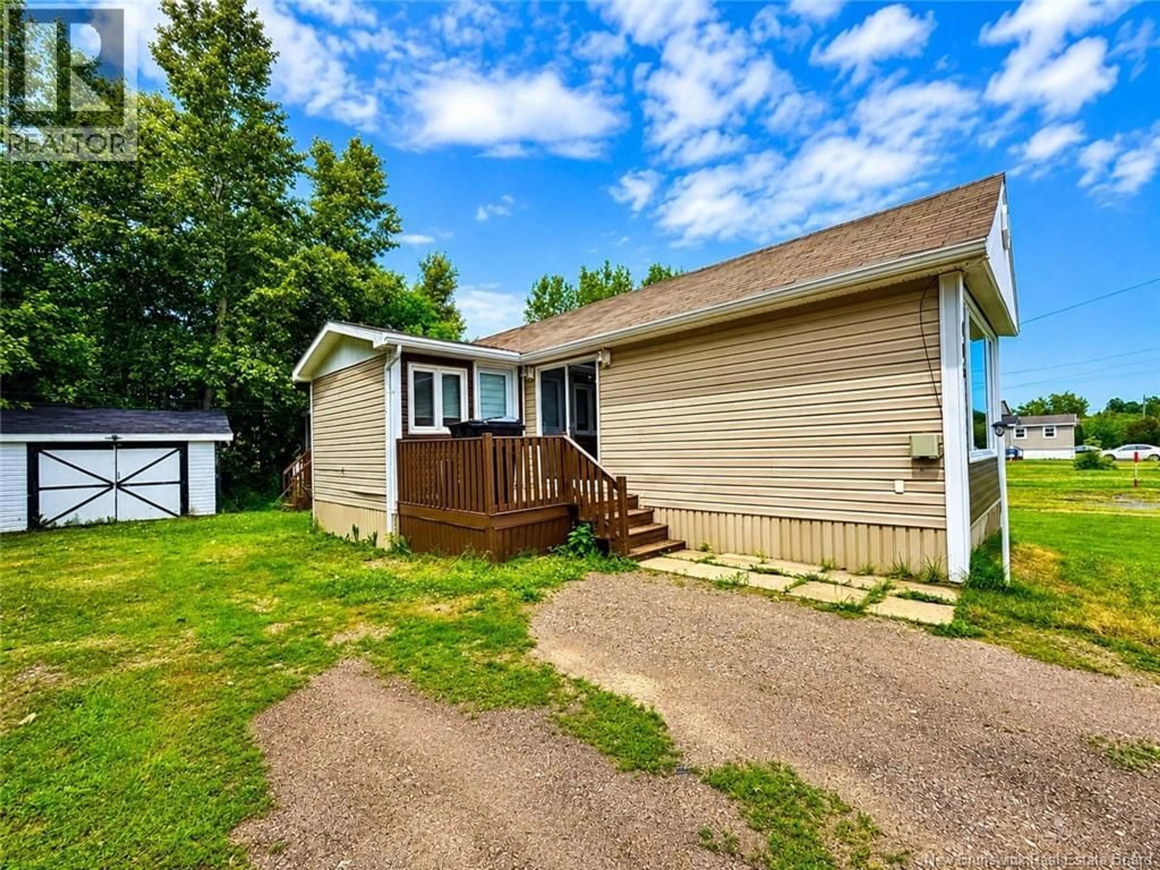 A pic from outside/outdoor area/front of a property/back of a property/a pic from drone, unknown for 405 BIRCH, Beresford New Brunswick E8K1E1