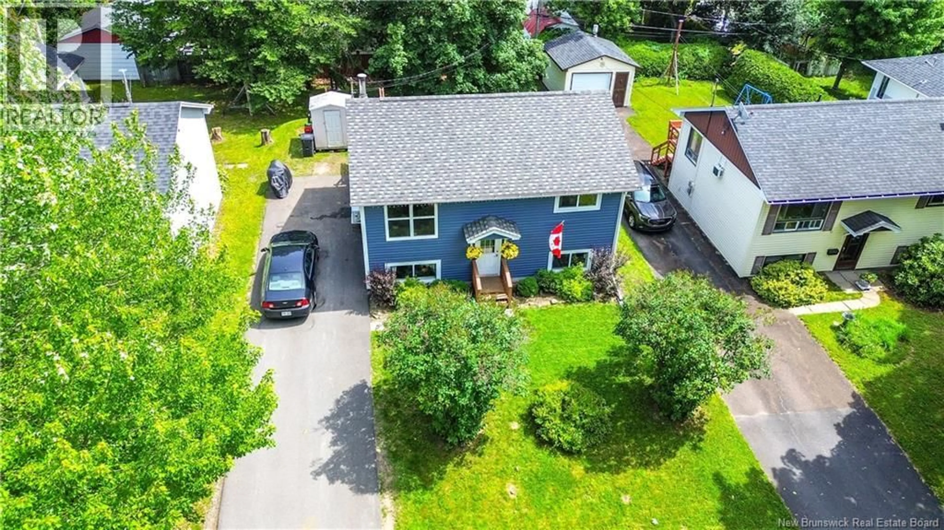 A pic from outside/outdoor area/front of a property/back of a property/a pic from drone, street for 10 LILAC CRESCENT, Fredericton New Brunswick E3A2G6