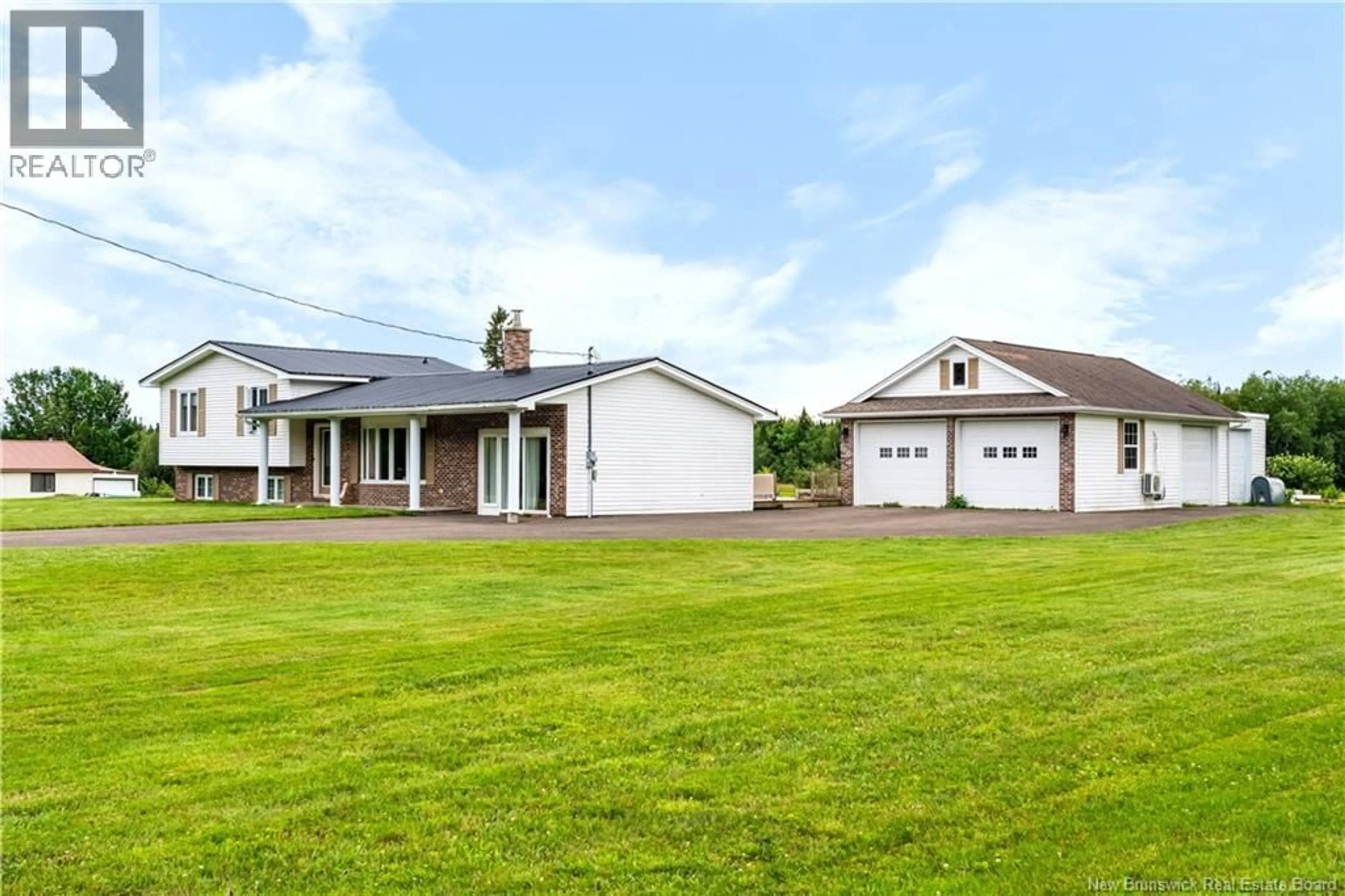 A pic from outside/outdoor area/front of a property/back of a property/a pic from drone, building for 4990 ROUTE 495, Sainte-Marie-De-Kent New Brunswick E4S1Z7