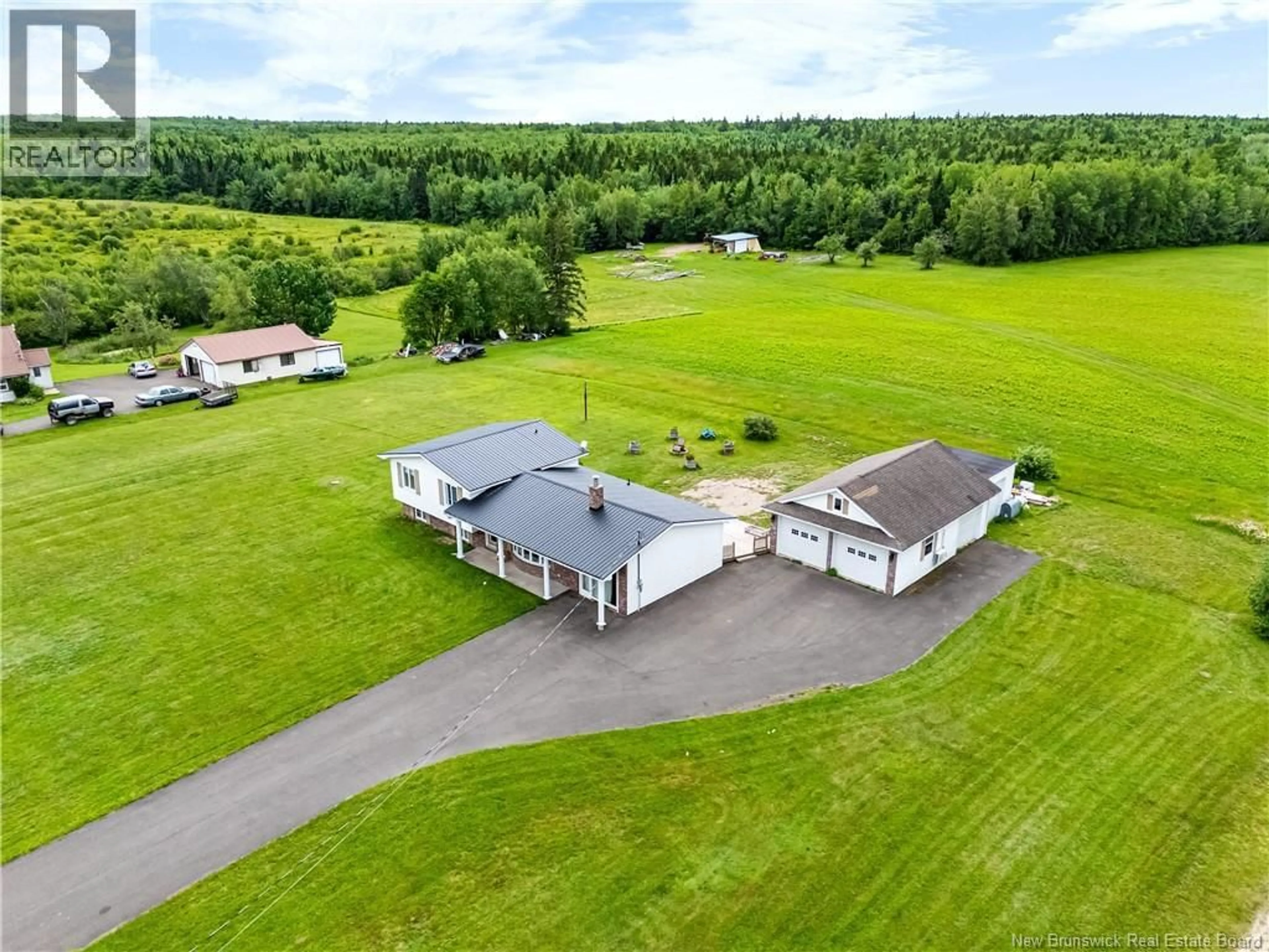 A pic from outside/outdoor area/front of a property/back of a property/a pic from drone, building for 4990 ROUTE 495, Sainte-Marie-De-Kent New Brunswick E4S1Z7
