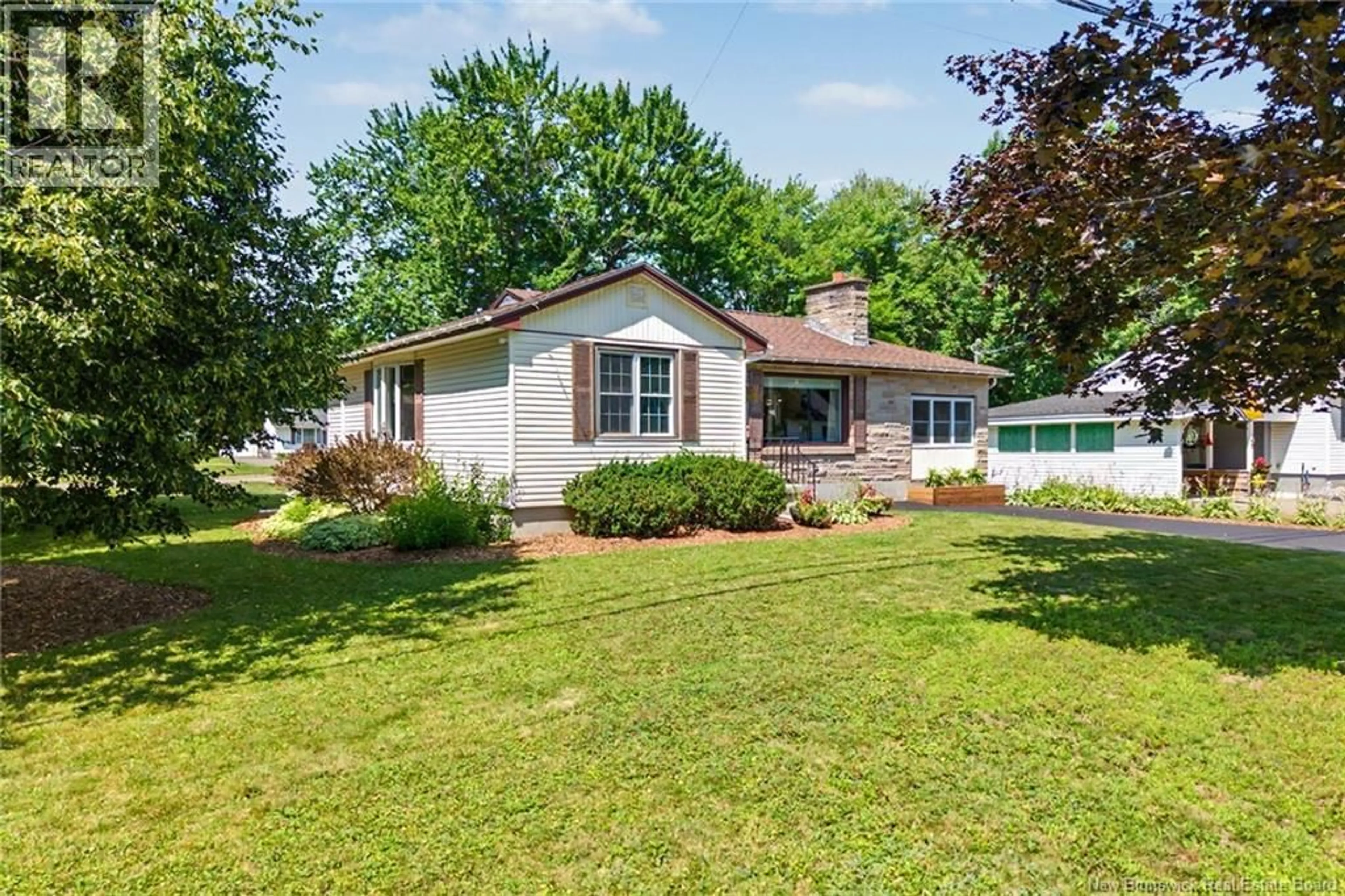 Home with vinyl exterior material, street for 18 FLORAL AVENUE, Fredericton New Brunswick E3A1K7