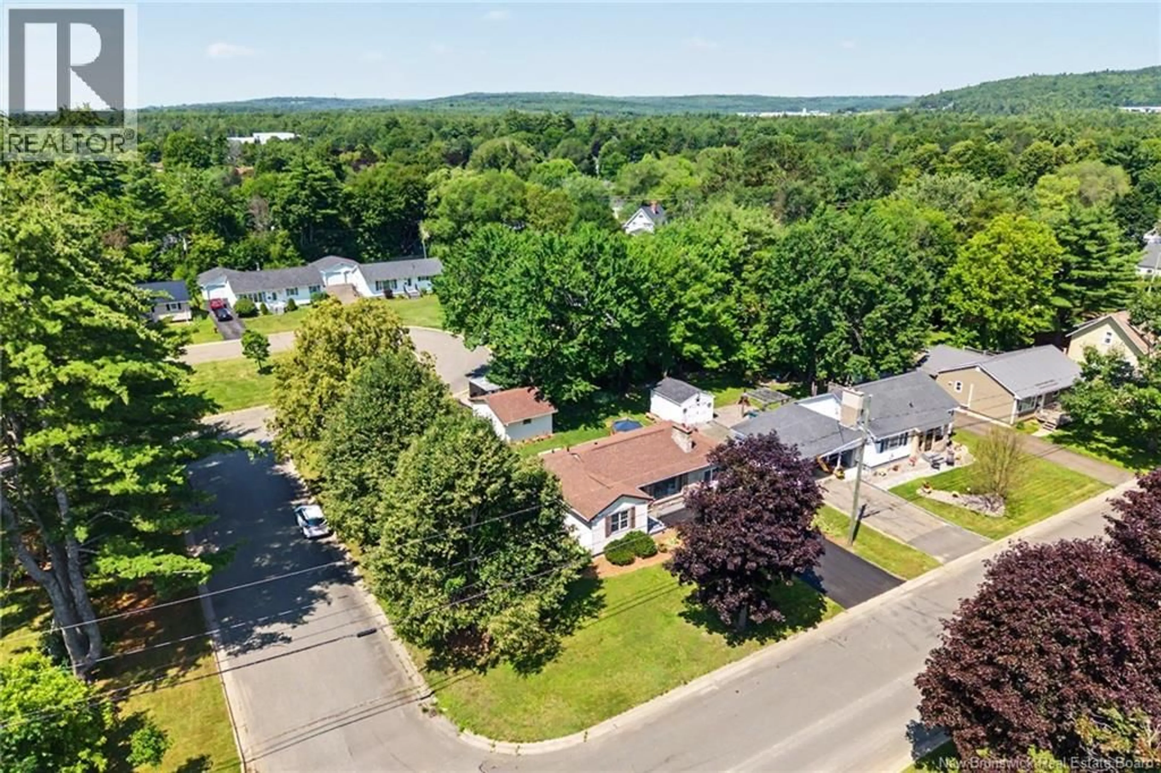 A pic from outside/outdoor area/front of a property/back of a property/a pic from drone, mountain view for 18 FLORAL AVENUE, Fredericton New Brunswick E3A1K7