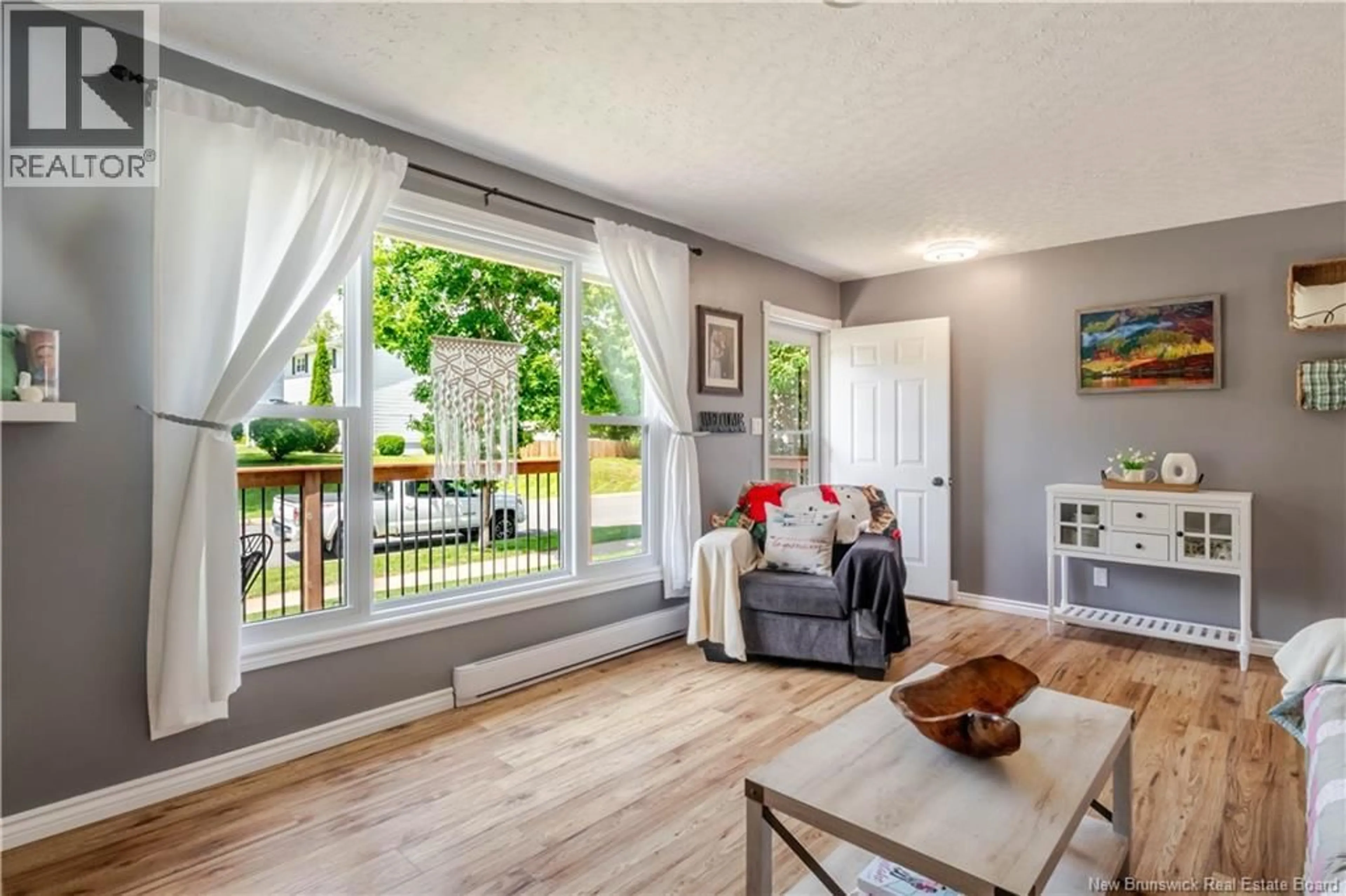Living room with furniture, wood/laminate floor for 90 BLISS STREET, Fredericton New Brunswick E3B5S9
