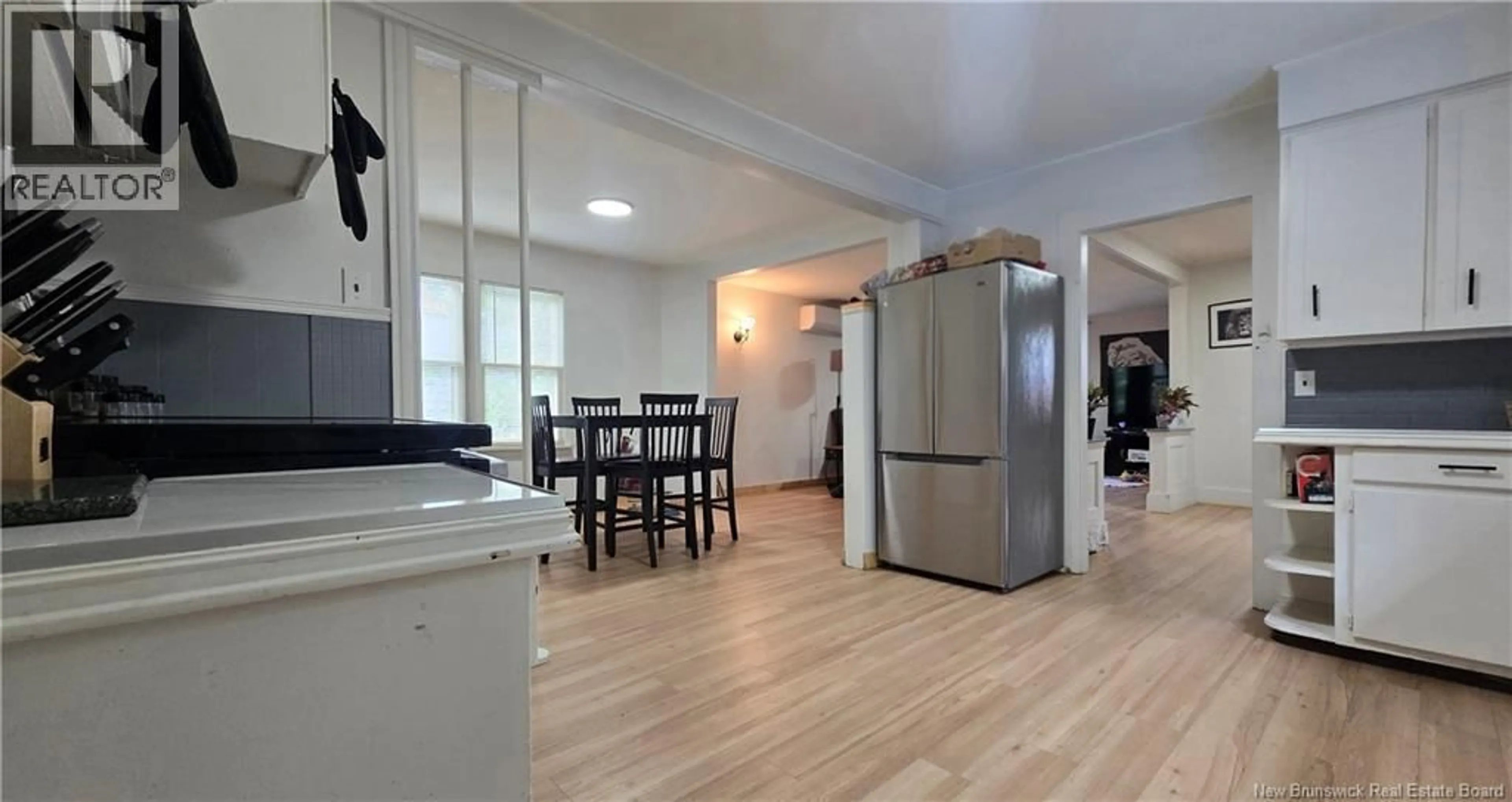 Open concept kitchen, wood/laminate floor for 136 RAMSAY STREET, Dalhousie New Brunswick E8C2H3