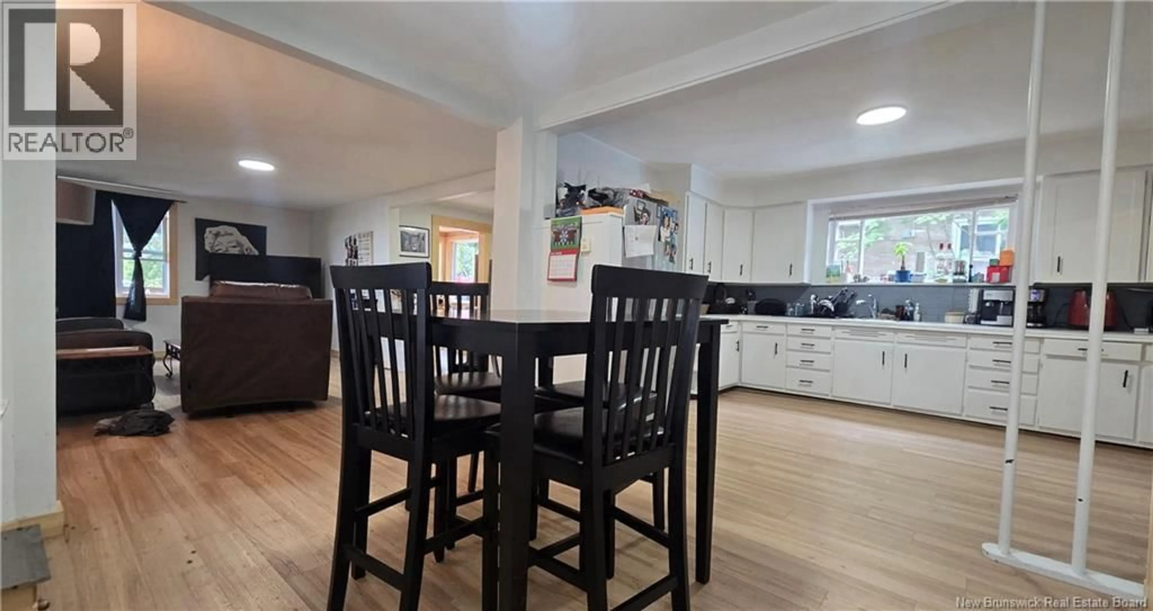 Open concept kitchen, wood/laminate floor for 136 RAMSAY STREET, Dalhousie New Brunswick E8C2H3
