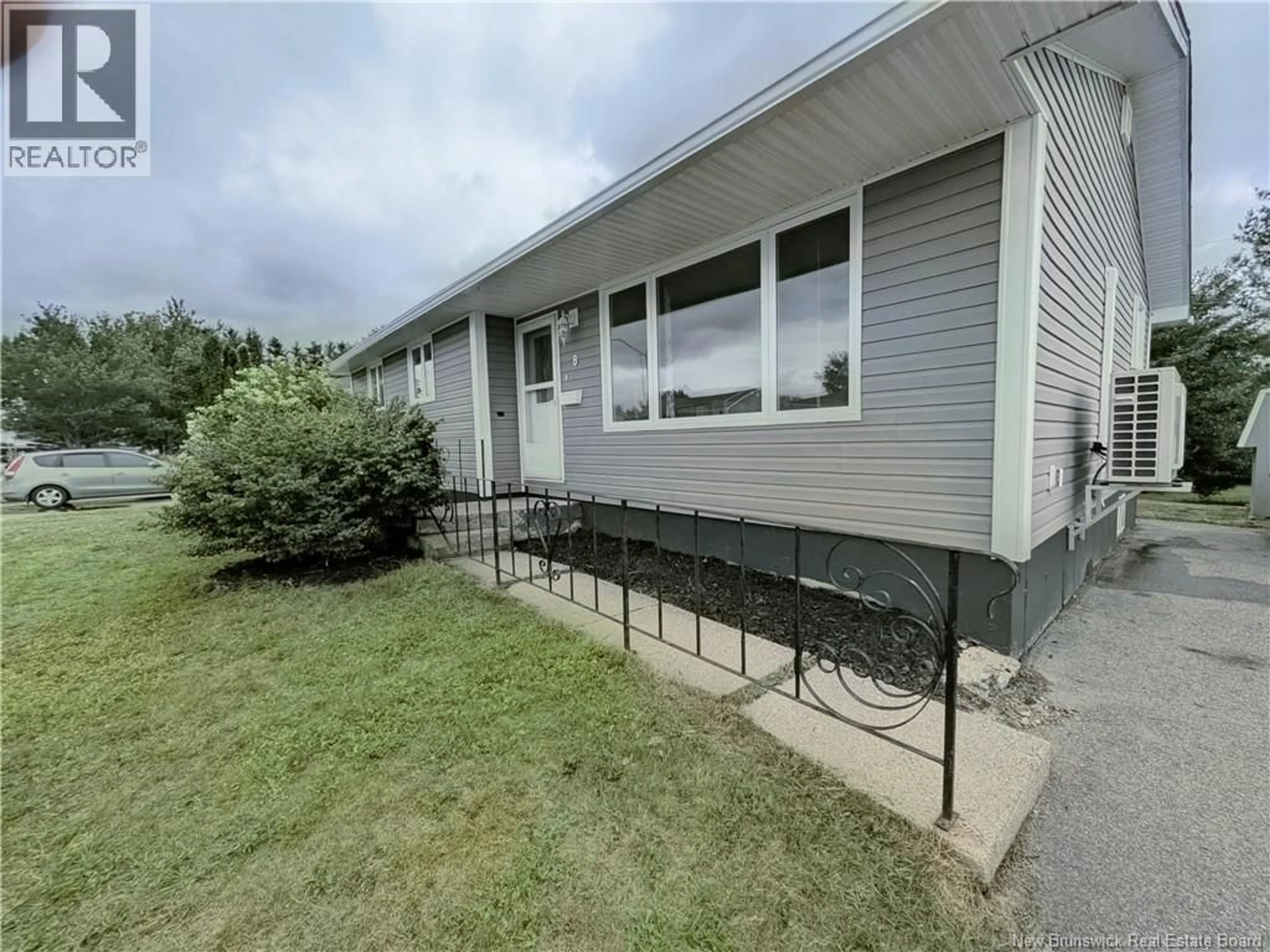 Home with vinyl exterior material, street for 8 BRAMALEA STREET, Miramichi New Brunswick E1N3B6