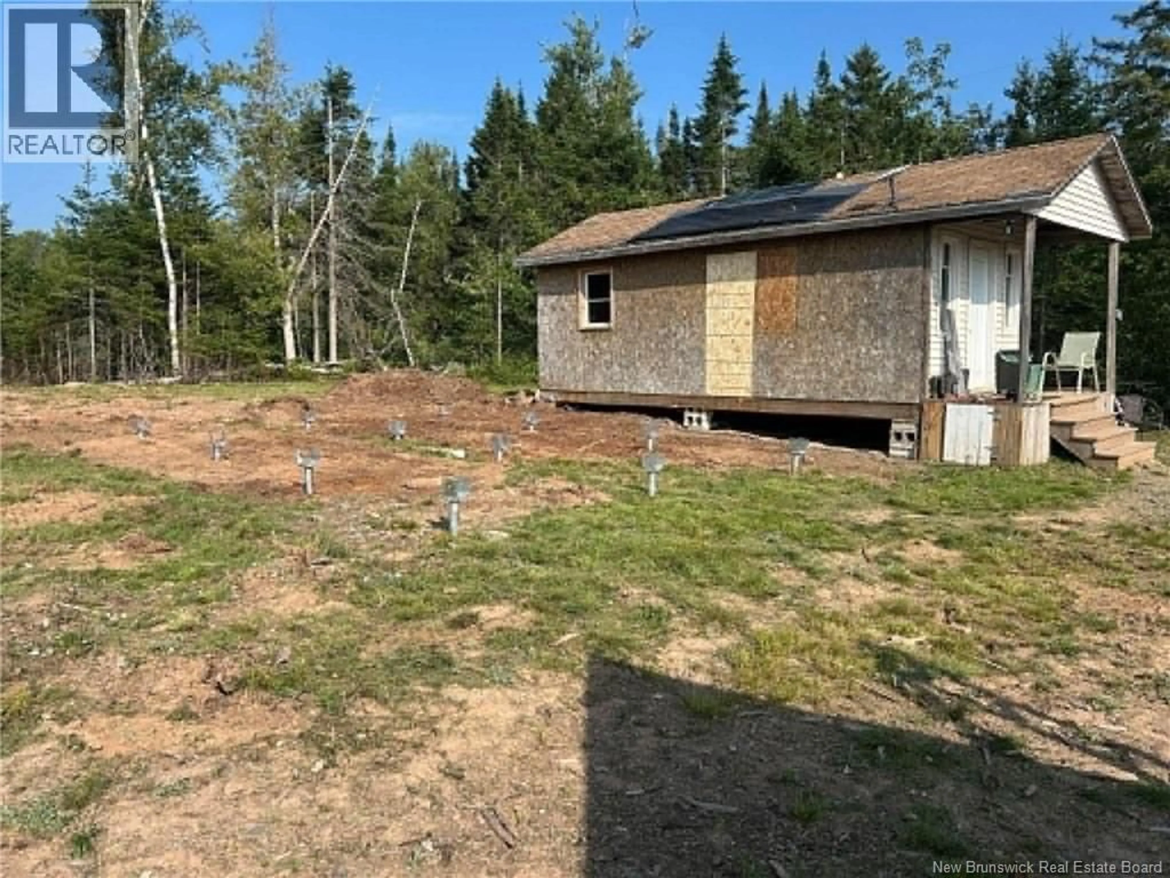 A pic from outside/outdoor area/front of a property/back of a property/a pic from drone, forest/trees view for 257 BASELINE ROAD, Kars New Brunswick E5T5B2