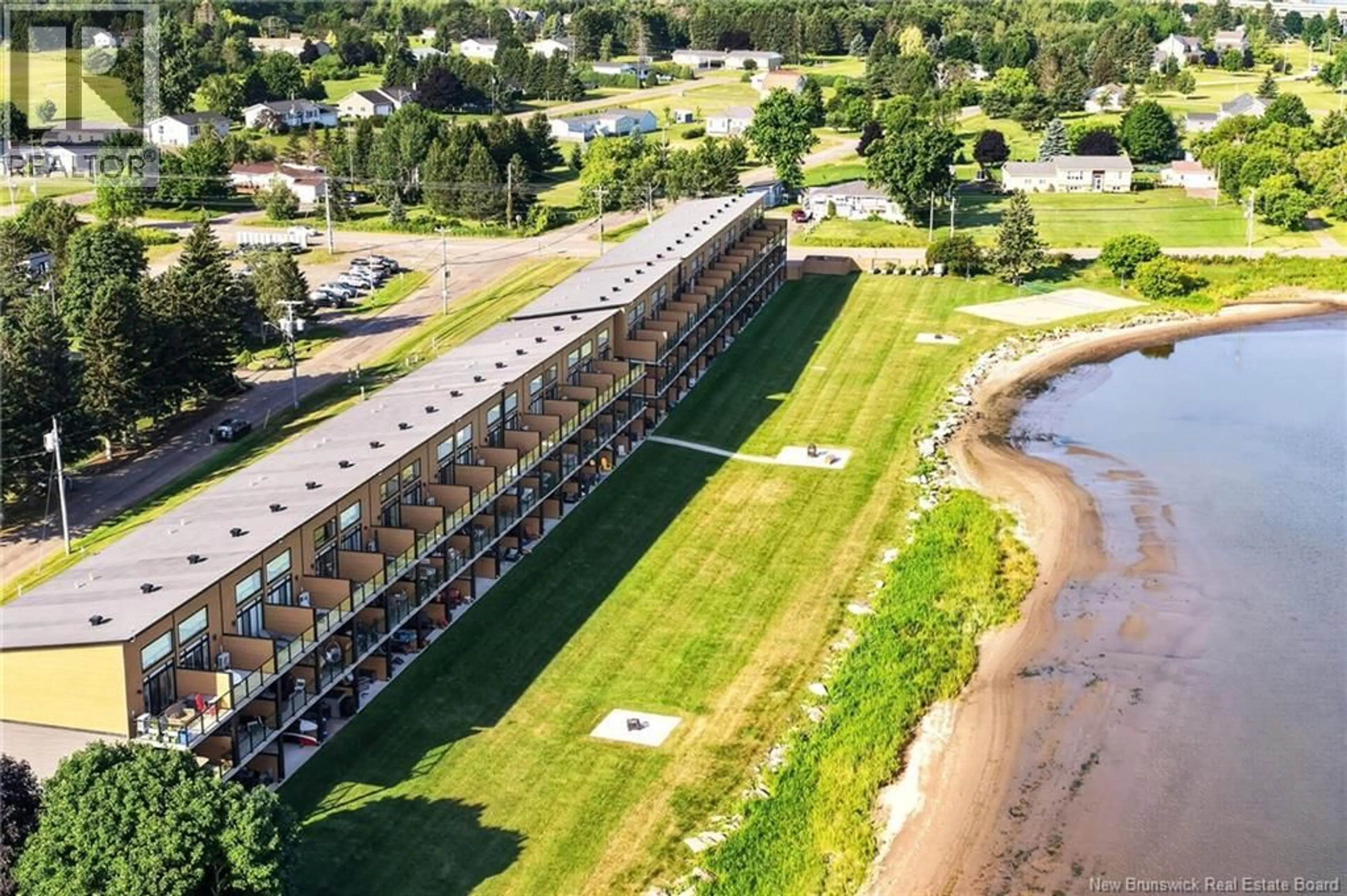 A pic from outside/outdoor area/front of a property/back of a property/a pic from drone, water/lake/river/ocean view for 114 - 3808 ROUTE 134, Shediac Bridge New Brunswick E4R1T5