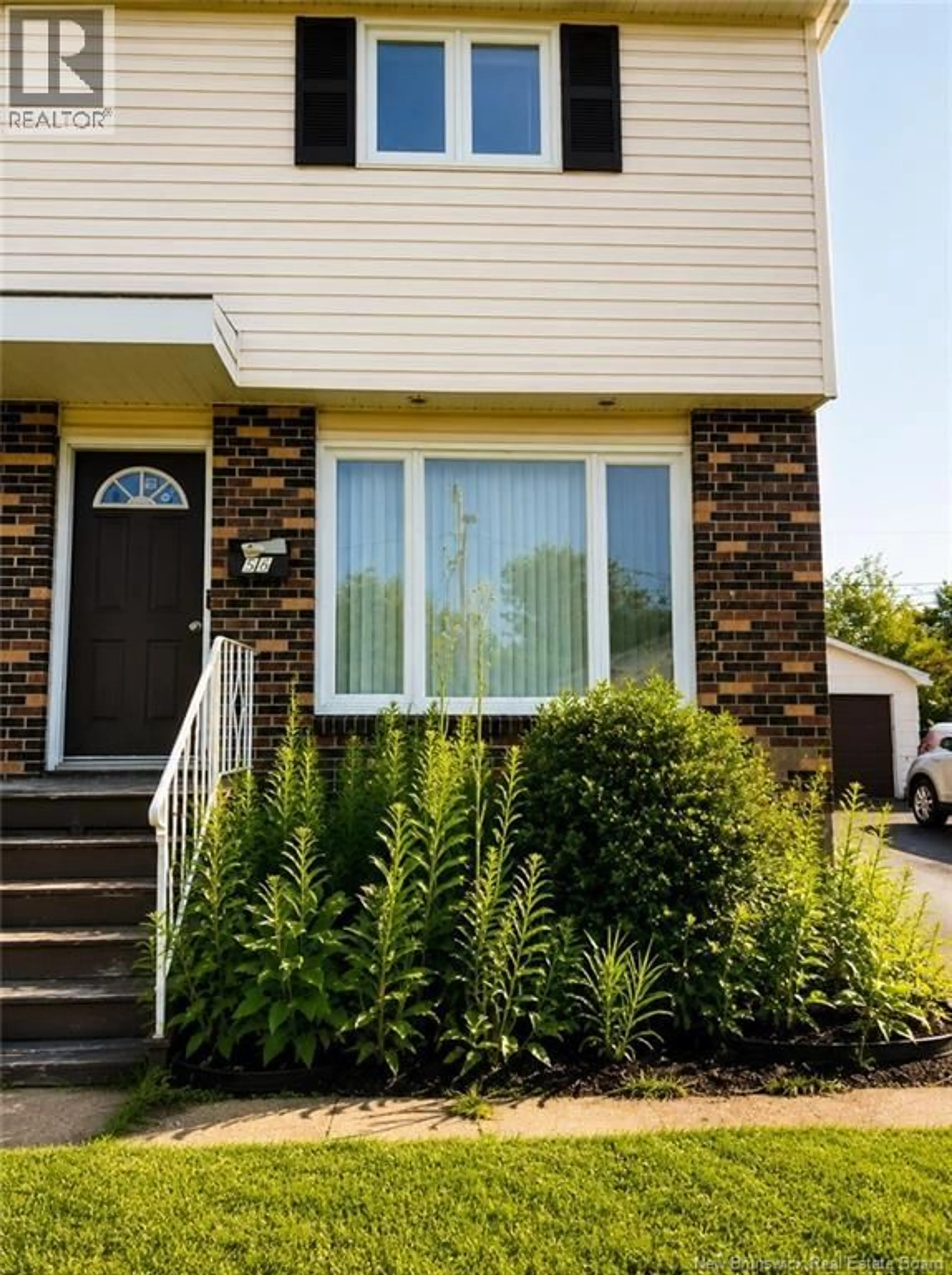 Home with vinyl exterior material, street for 66 WHITNEY AVENUE, Moncton New Brunswick E1C8C6