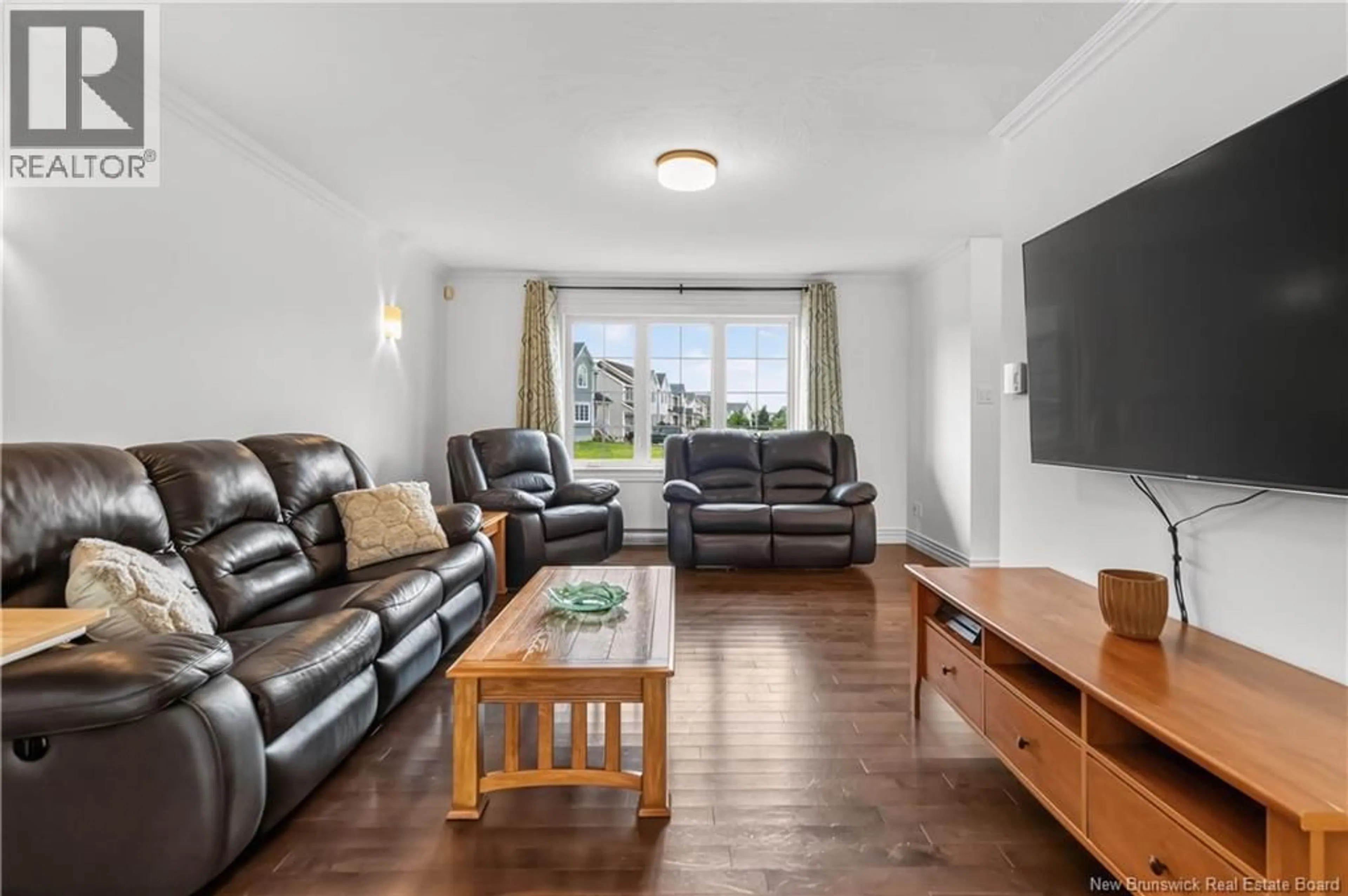 Living room with furniture, wood/laminate floor for 140 MADRID, Riverview New Brunswick E1B0G5