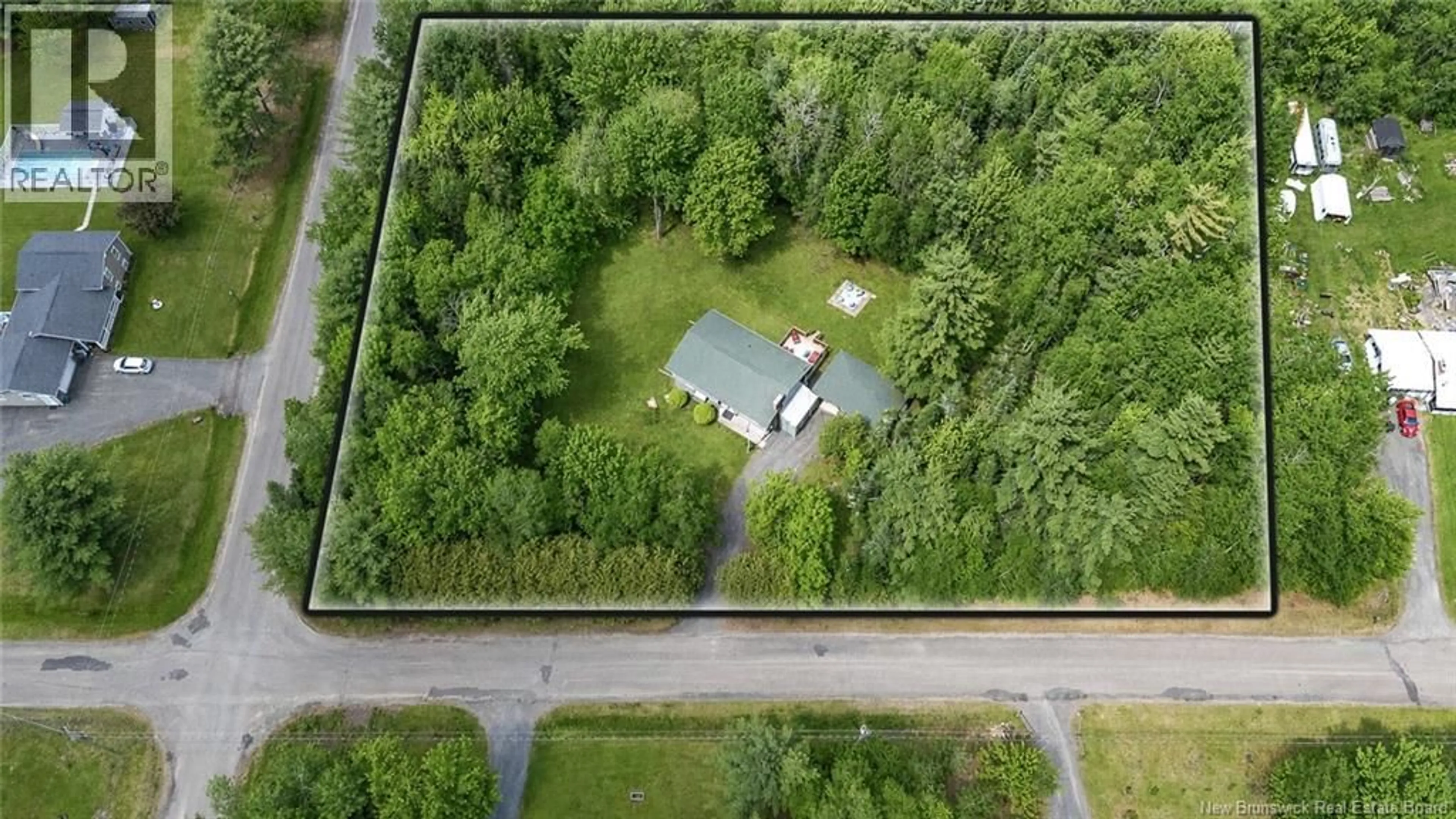 A pic from outside/outdoor area/front of a property/back of a property/a pic from drone, unknown for 215 HUGHES STREET, Noonan New Brunswick E3A7B4
