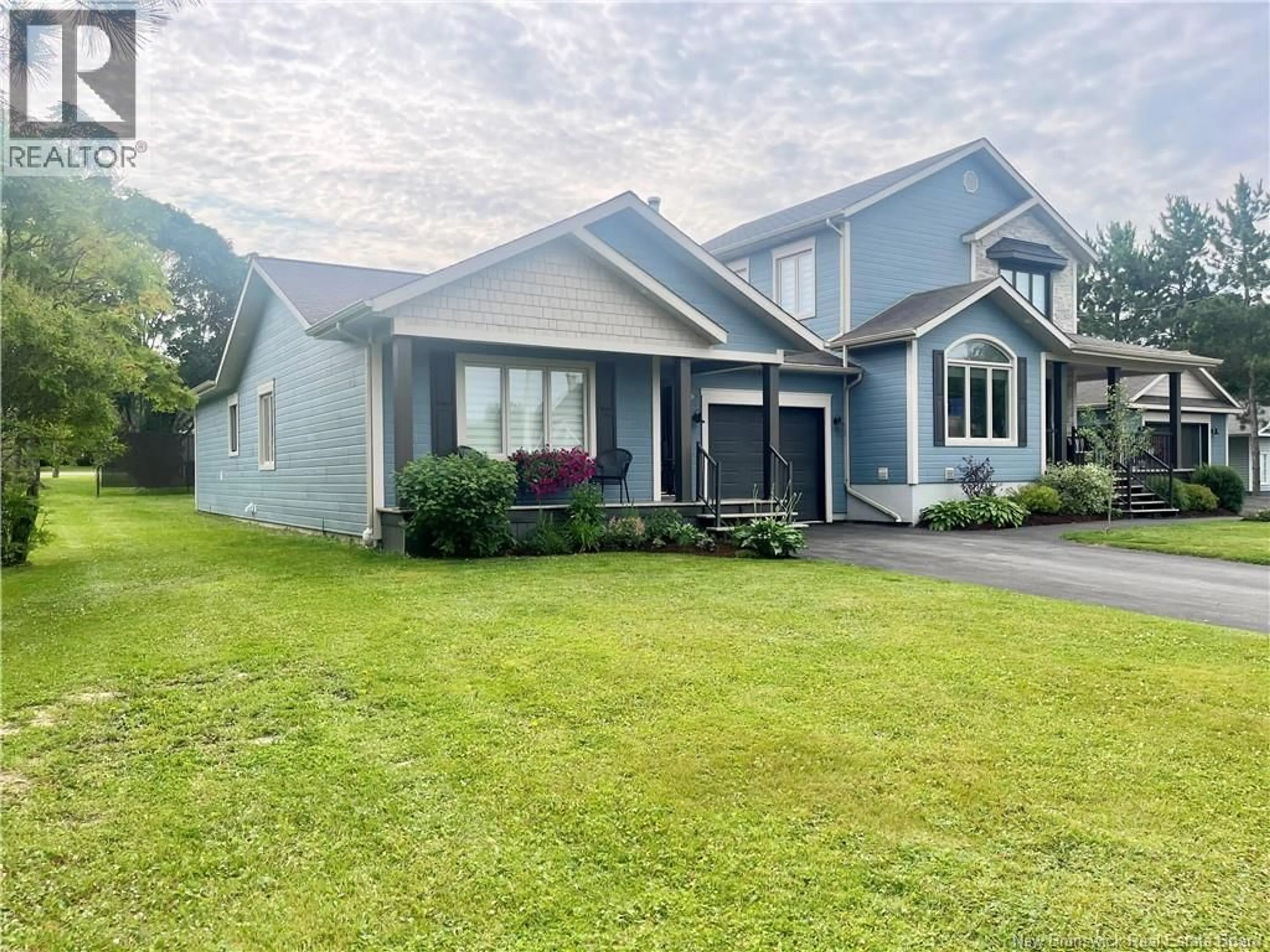 Home with vinyl exterior material, street for 37 BEAULIEU STREET, Saint-Quentin New Brunswick E8A1B5