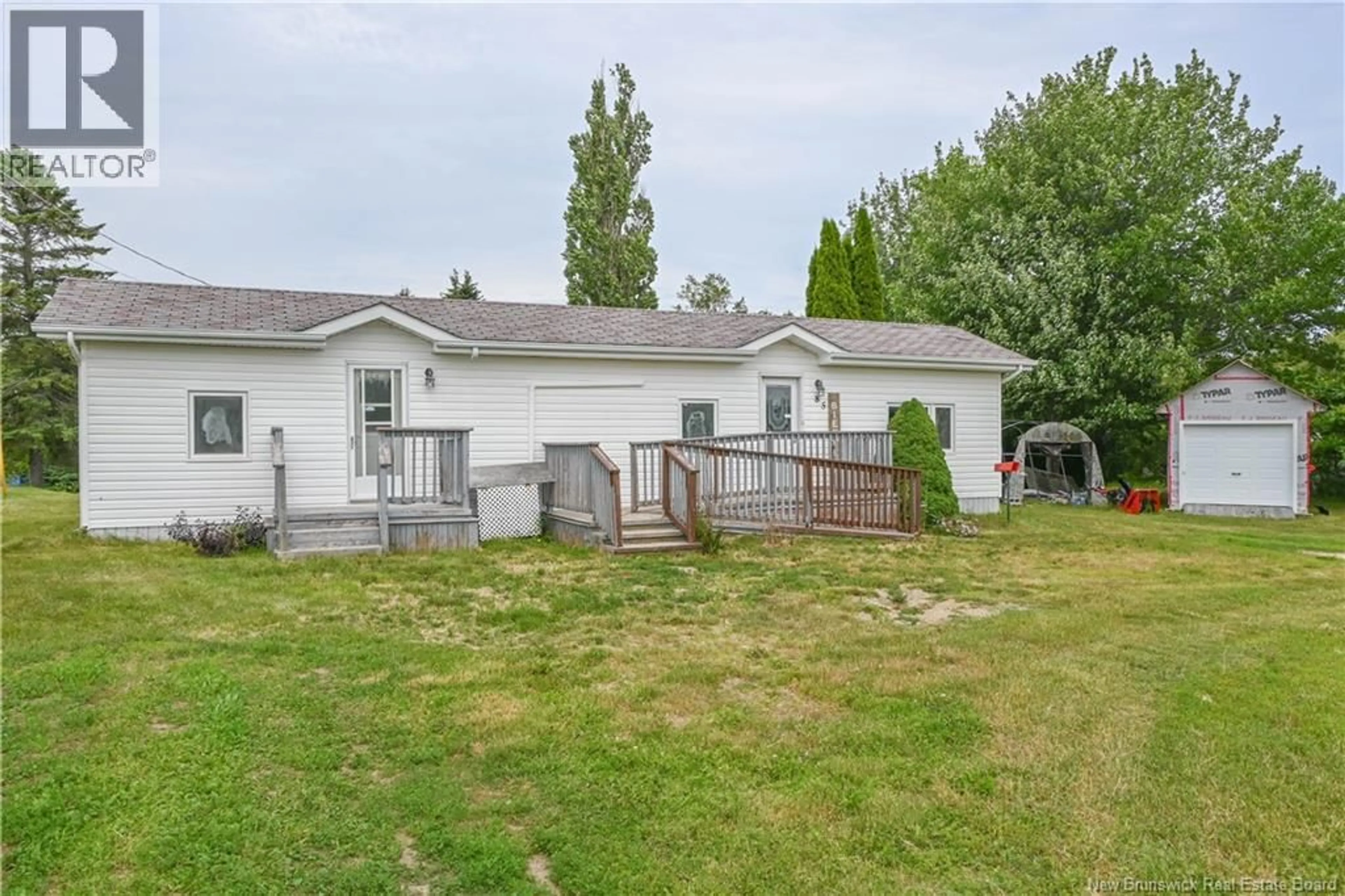 A pic from outside/outdoor area/front of a property/back of a property/a pic from drone, unknown for 85 SYLVAIN STREET, Tracadie New Brunswick E1X1X9
