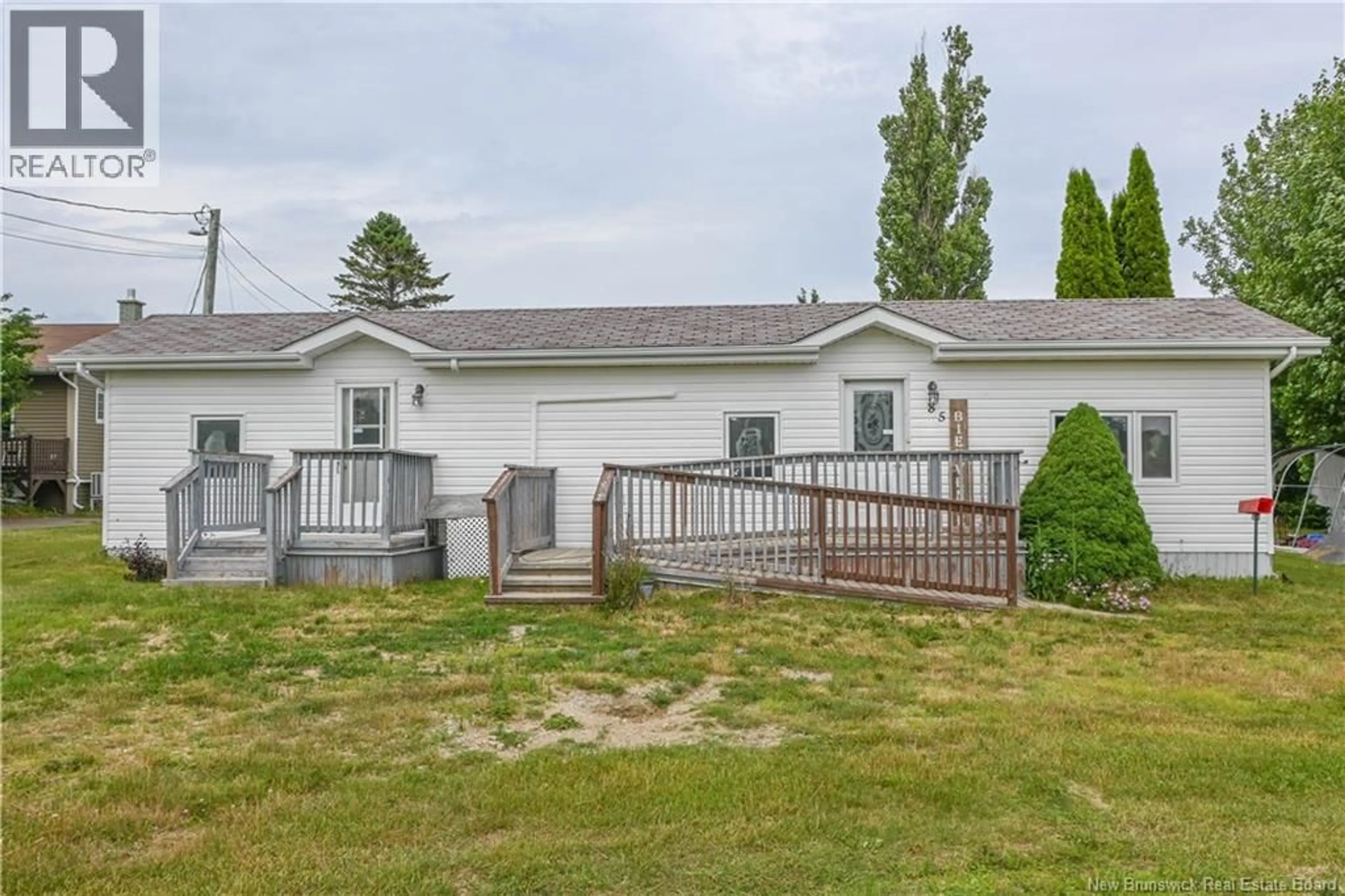 A pic from outside/outdoor area/front of a property/back of a property/a pic from drone, unknown for 85 SYLVAIN STREET, Tracadie New Brunswick E1X1X9