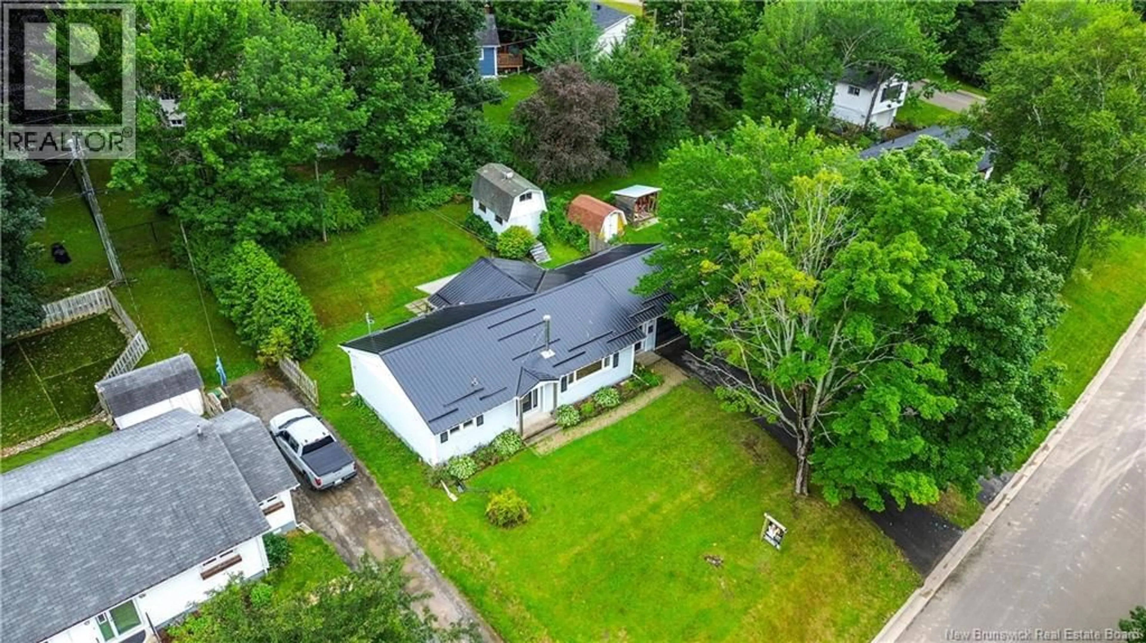 A pic from outside/outdoor area/front of a property/back of a property/a pic from drone, street for 22 BIRCHCROFT DRIVE, Fredericton New Brunswick E3C1K7