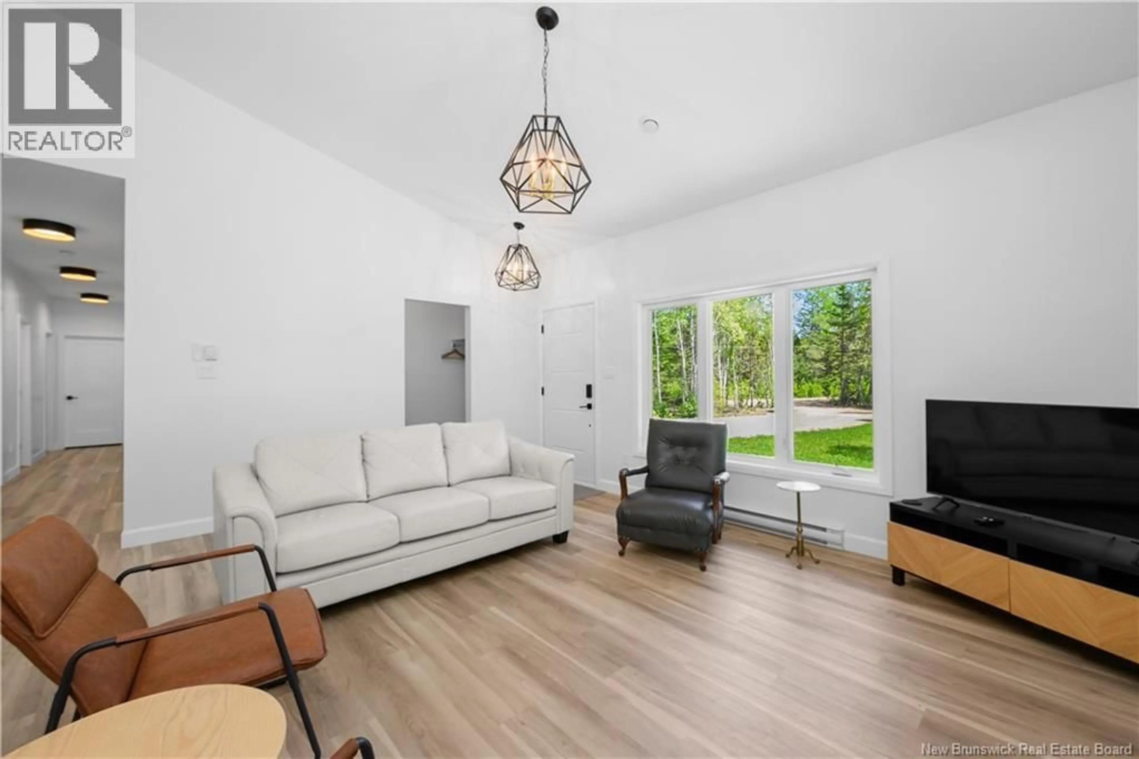 Living room with furniture, unknown for 30 BARON ROAD, Grand-Barachois New Brunswick E4P9A6