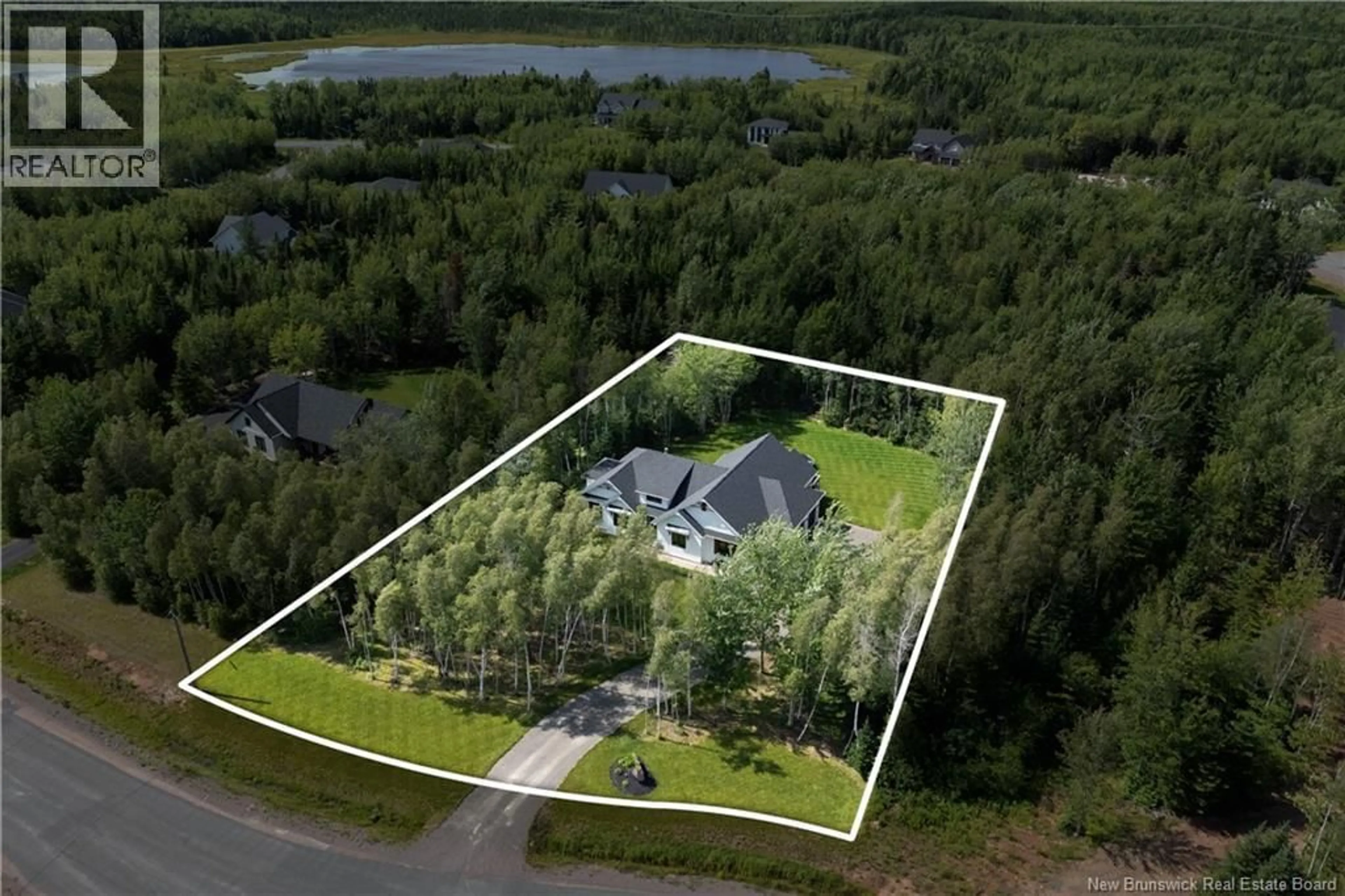 A pic from outside/outdoor area/front of a property/back of a property/a pic from drone, water/lake/river/ocean view for 18 MESANGE COURT, Greater Lakeburn New Brunswick E1H0N4