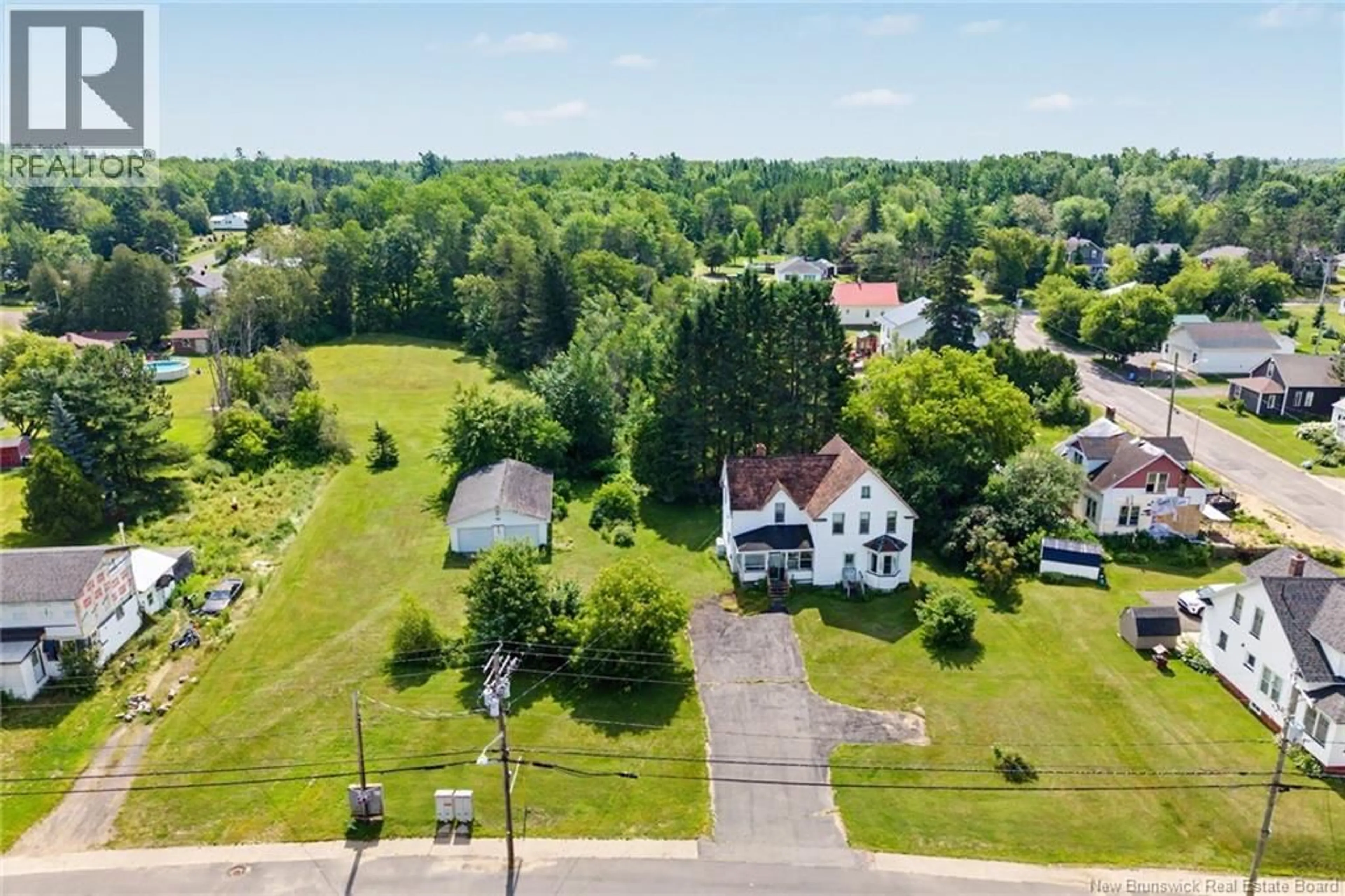A pic from outside/outdoor area/front of a property/back of a property/a pic from drone, street for 125 MAIN STREET, Chipman New Brunswick E4A1H4
