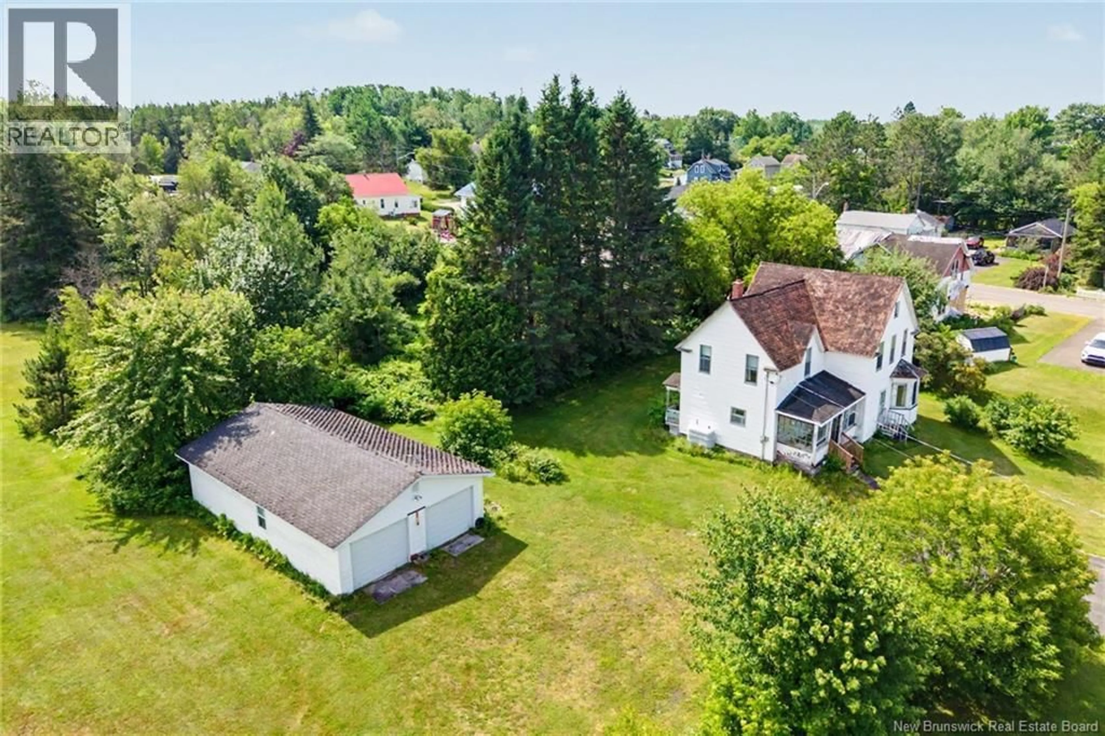 A pic from outside/outdoor area/front of a property/back of a property/a pic from drone, unknown for 125 MAIN STREET, Chipman New Brunswick E4A1H4