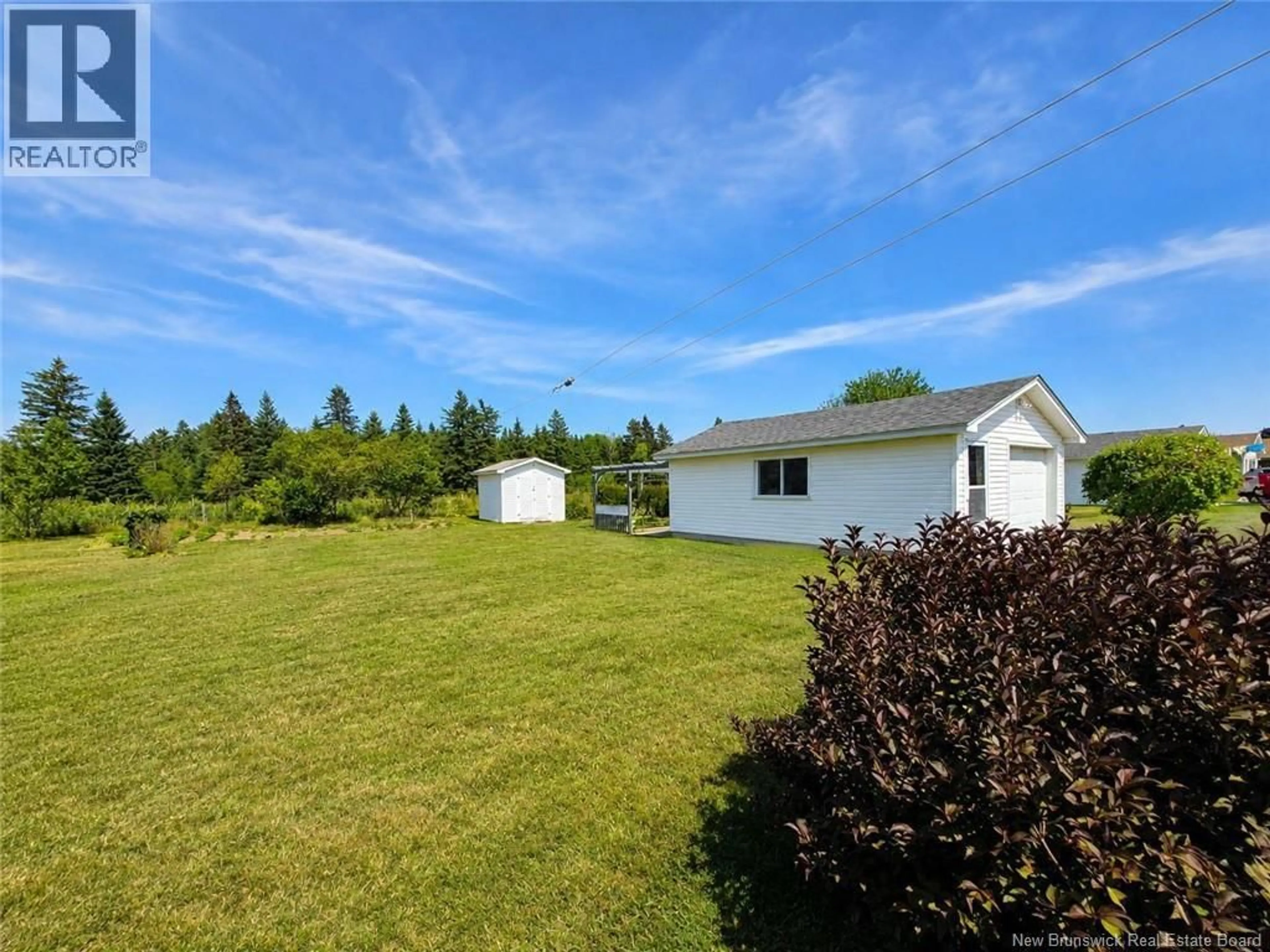 A pic from outside/outdoor area/front of a property/back of a property/a pic from drone, water/lake/river/ocean view for 4212 CH FOSTER, Tracadie New Brunswick E1X1C2