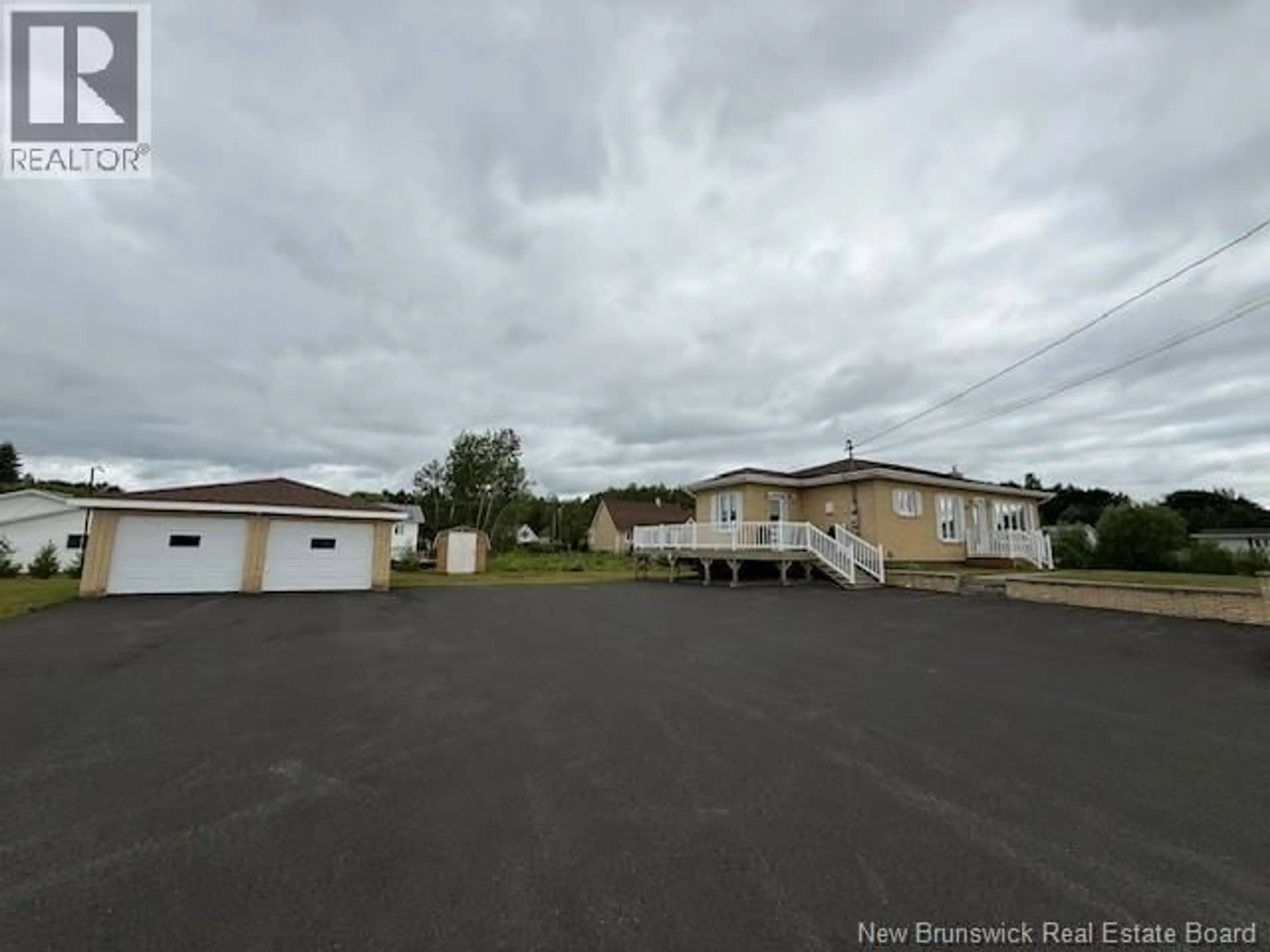 A pic from outside/outdoor area/front of a property/back of a property/a pic from drone, street for 634 DARLINGTON DRIVE, Dalhousie New Brunswick E8C1N3