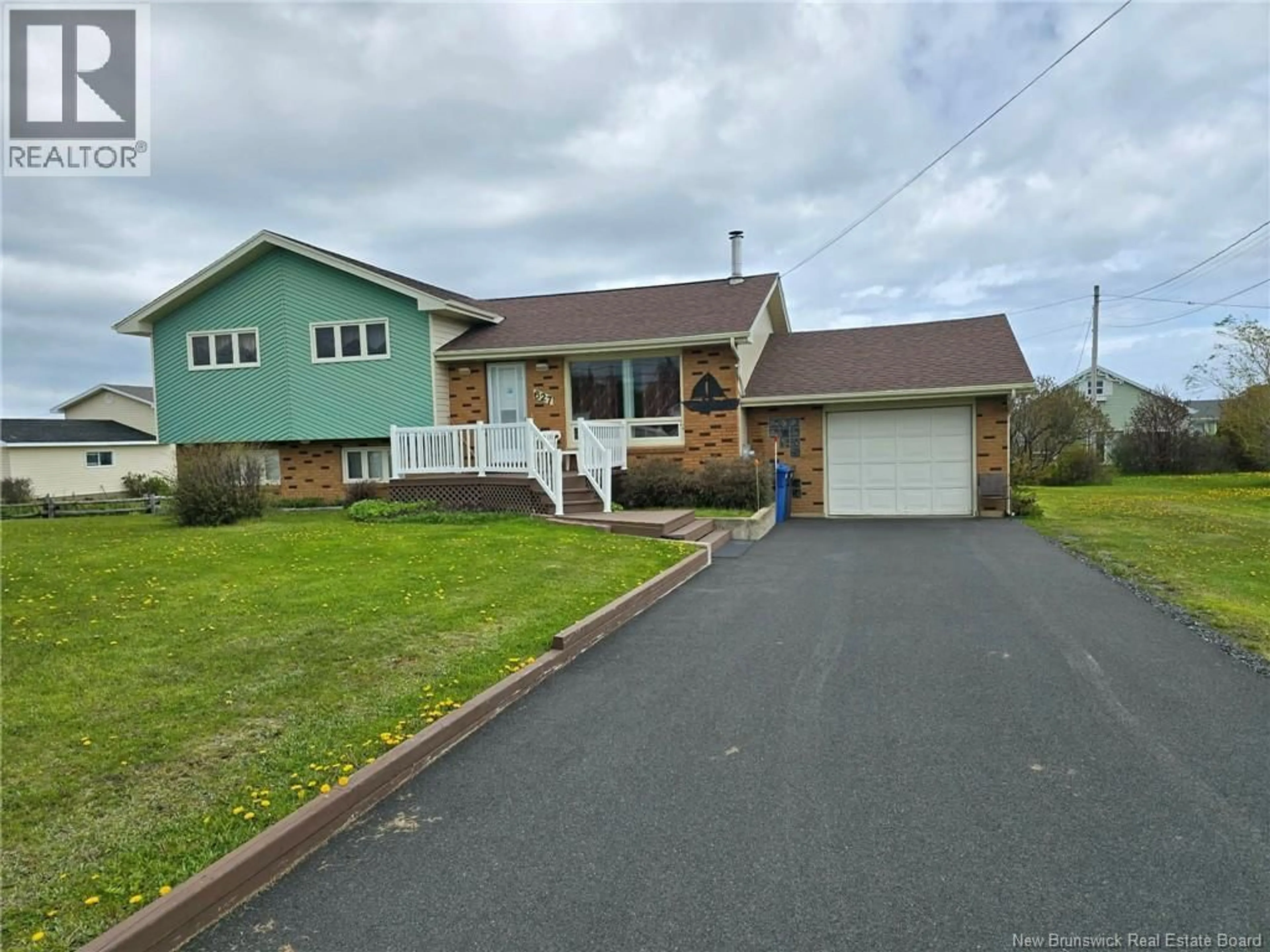 Home with vinyl exterior material, street for 627 PRINCIPALE STREET, Pointe-Verte New Brunswick E8J2P7