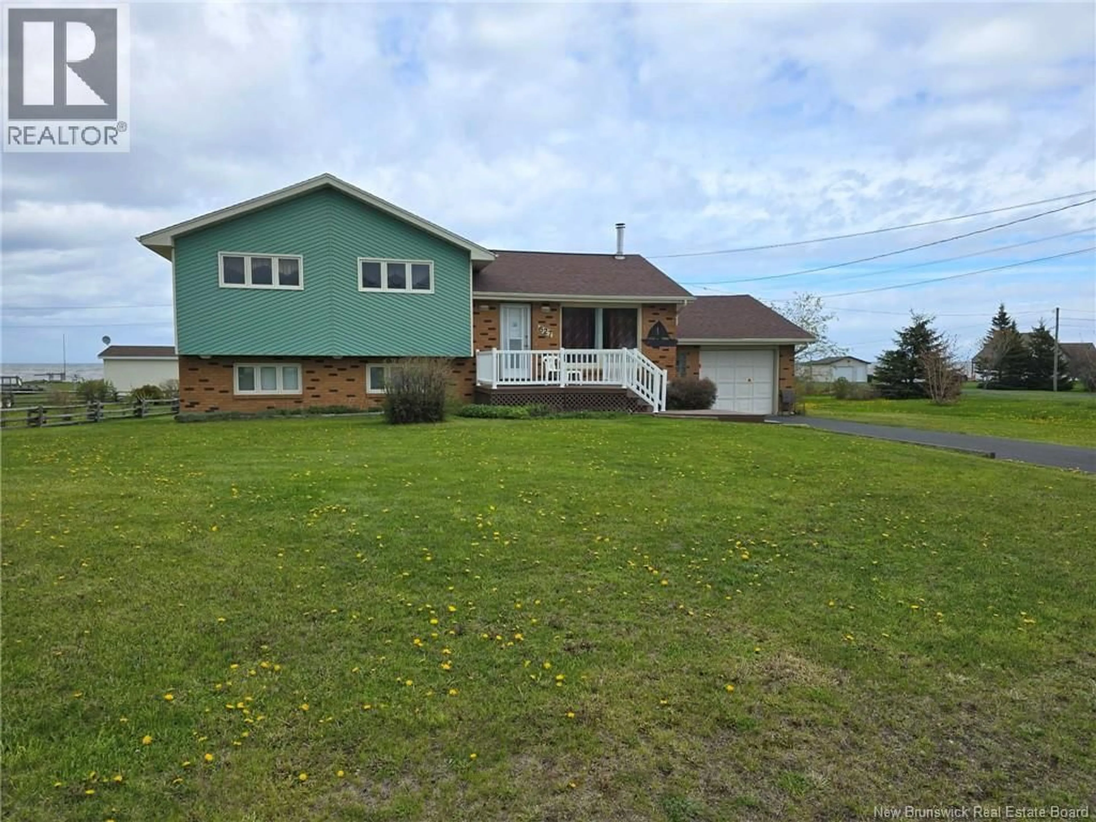 A pic from outside/outdoor area/front of a property/back of a property/a pic from drone, unknown for 627 PRINCIPALE STREET, Pointe-Verte New Brunswick E8J2P7