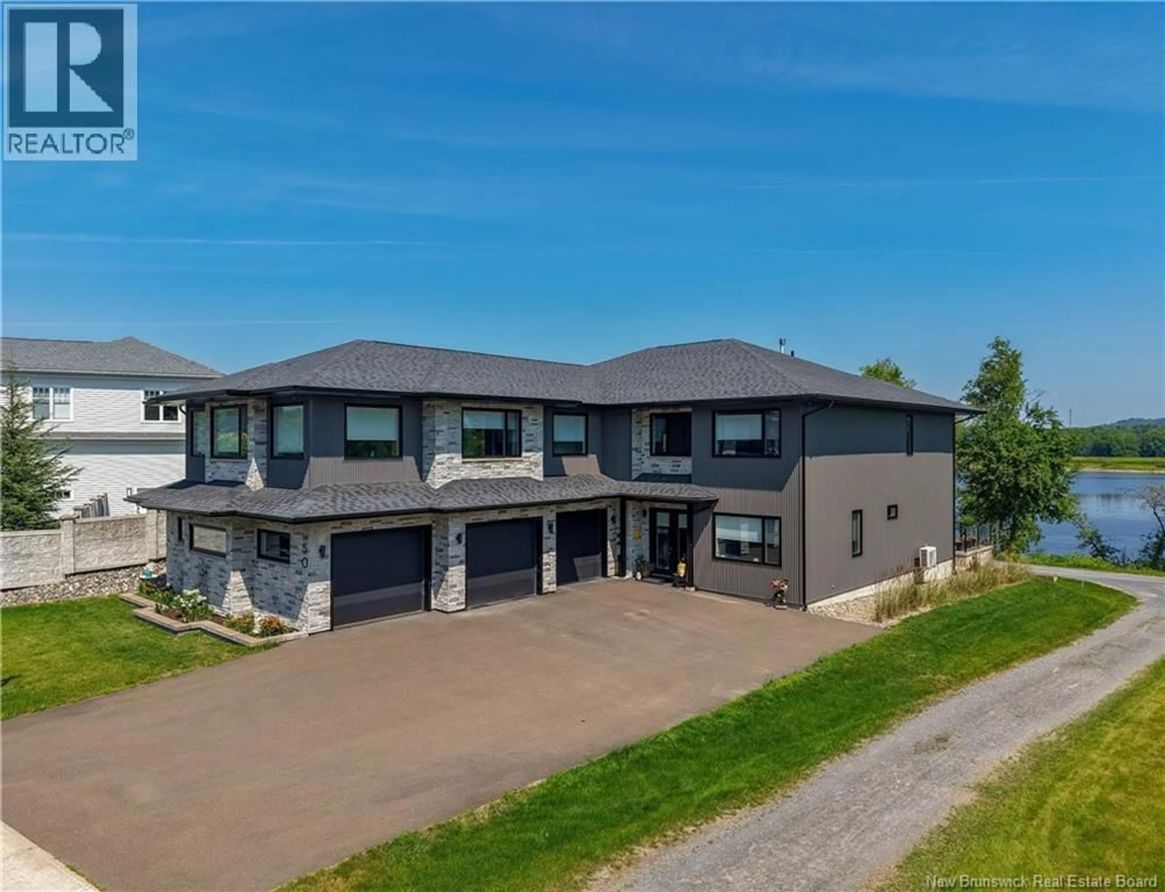 A pic from outside/outdoor area/front of a property/back of a property/a pic from drone, unknown for 50 STILL WATER CRESCENT, Fredericton New Brunswick E3B0V8