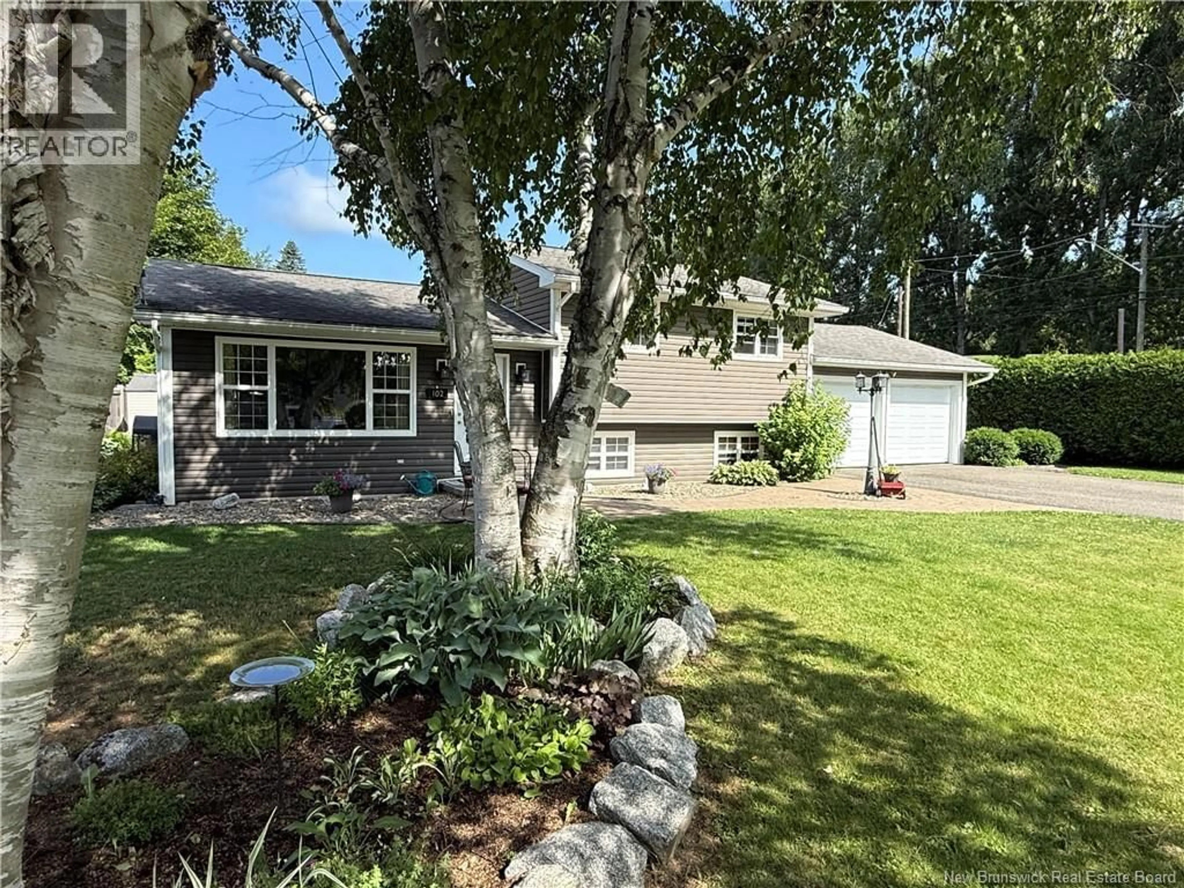 A pic from outside/outdoor area/front of a property/back of a property/a pic from drone, unknown for 102 SCOTT STREET, Woodstock New Brunswick E7M2P9