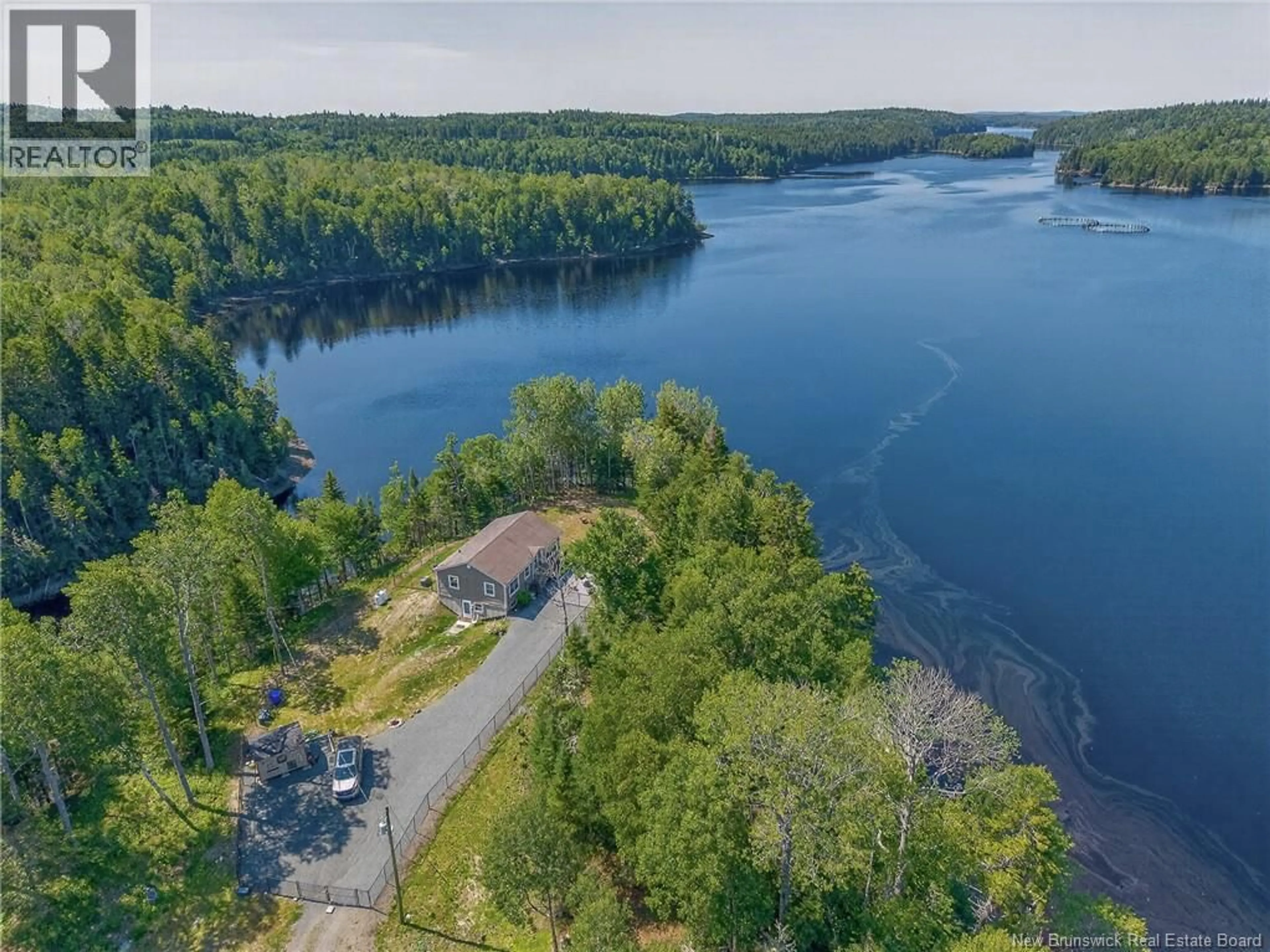 A pic from outside/outdoor area/front of a property/back of a property/a pic from drone, water/lake/river/ocean view for 230 MEALEY ROAD, Pennfield New Brunswick E5H0B1