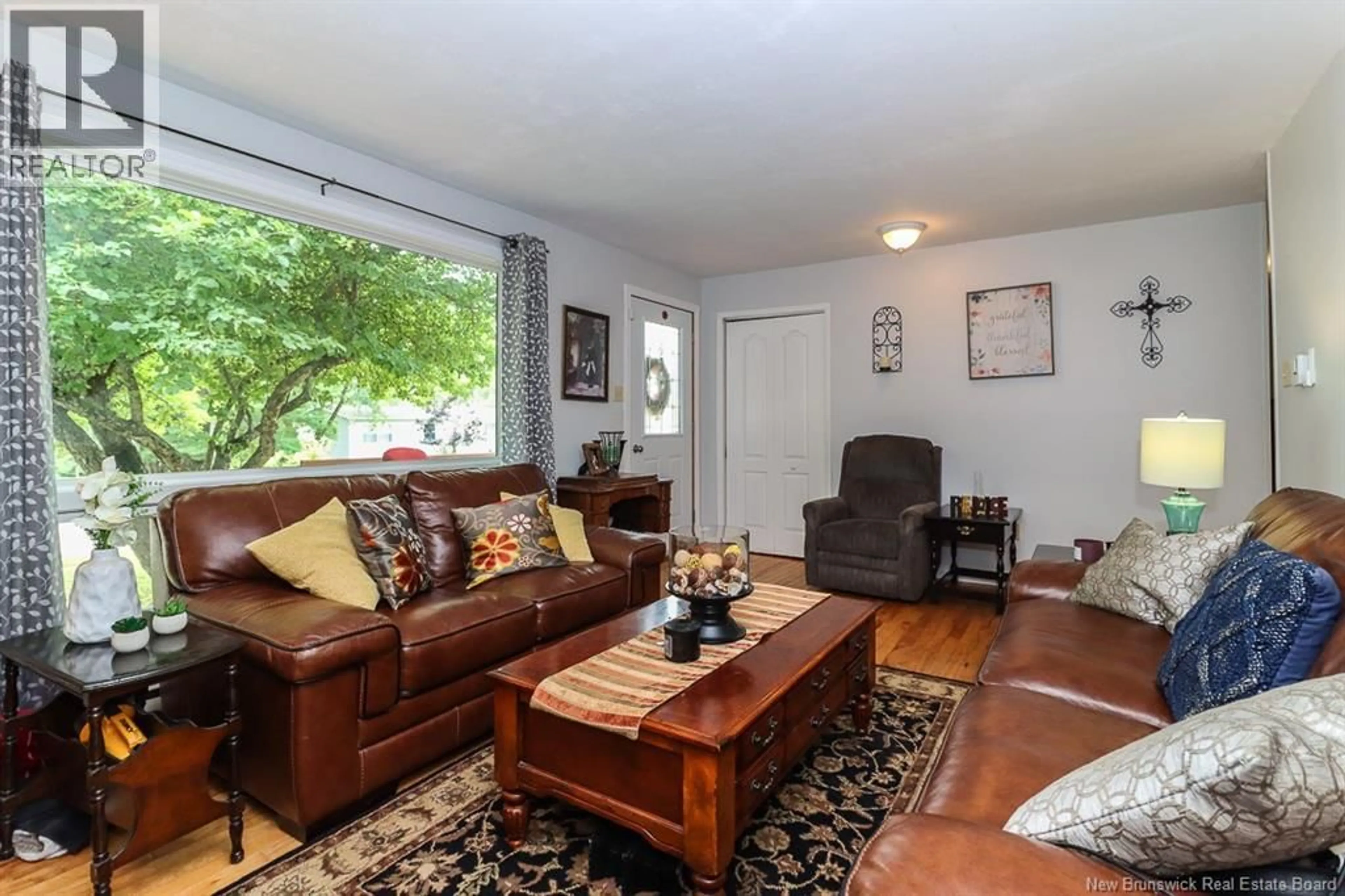Living room with furniture, wood/laminate floor for 3 FAIRMONT DRIVE, Hampton New Brunswick E5N7E4