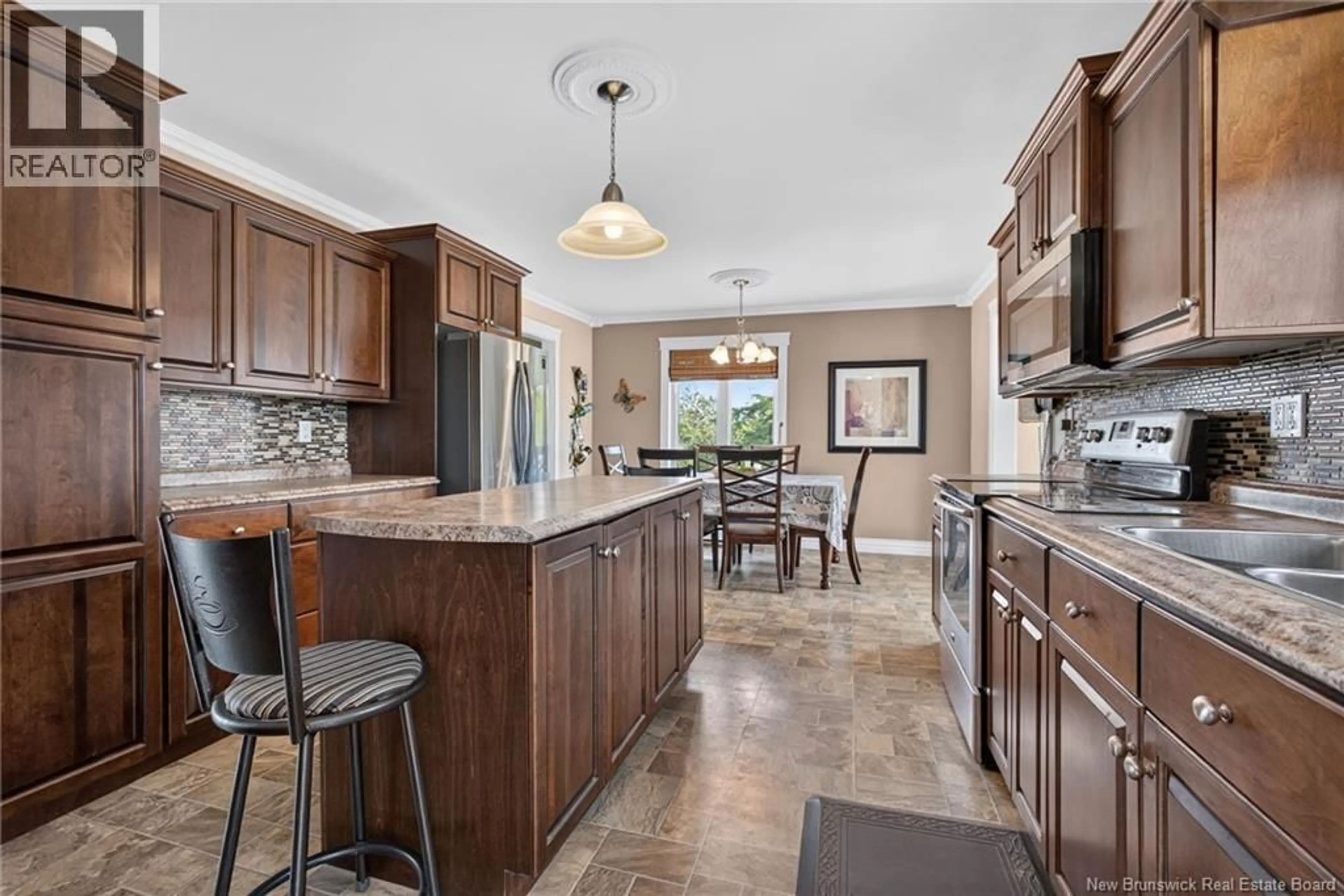 Open concept kitchen, ceramic/tile floor for 2481 ROUTE 475, Saint-Edouard-De-Kent New Brunswick E4S4W5