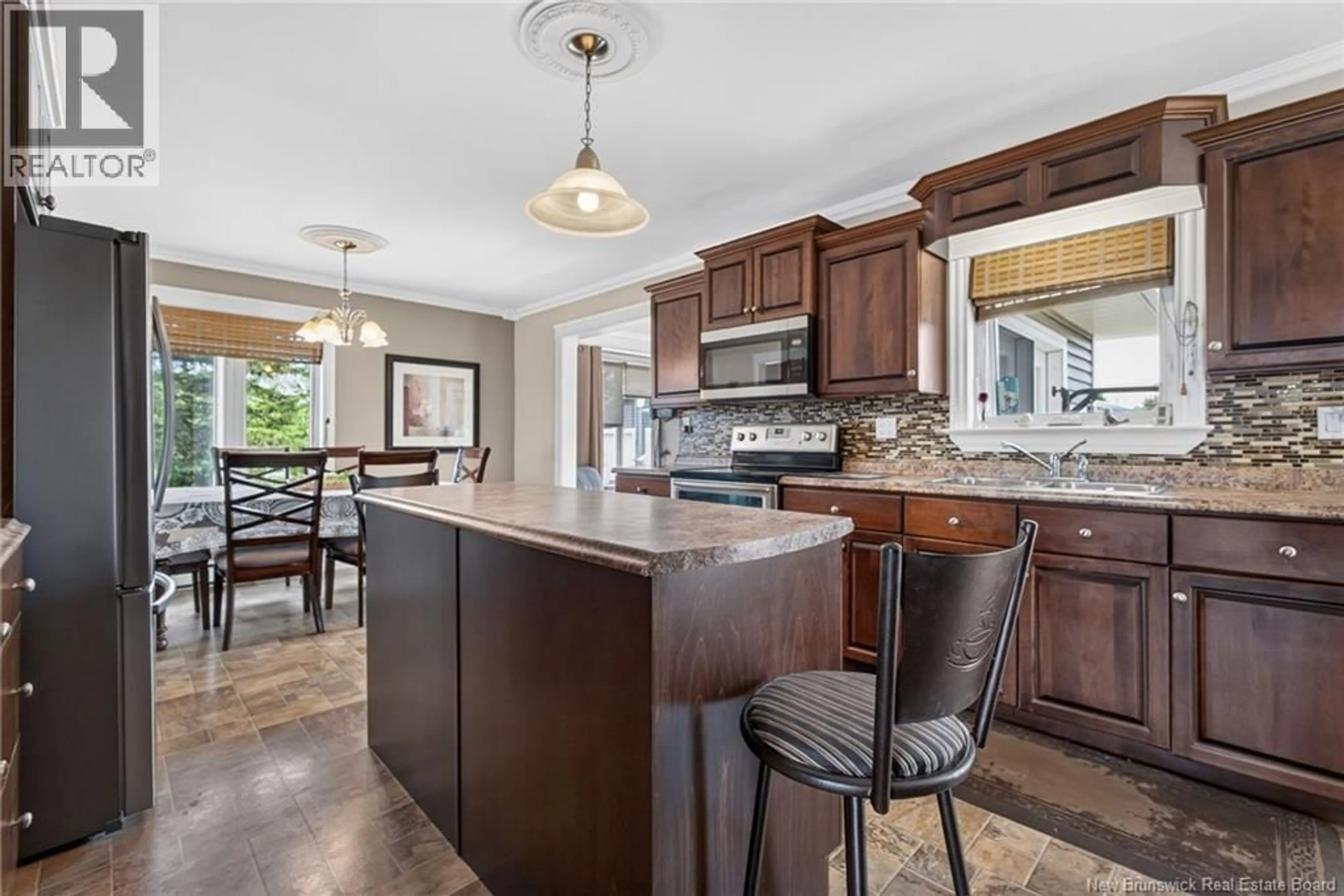 Open concept kitchen, ceramic/tile floor for 2481 ROUTE 475, Saint-Edouard-De-Kent New Brunswick E4S4W5